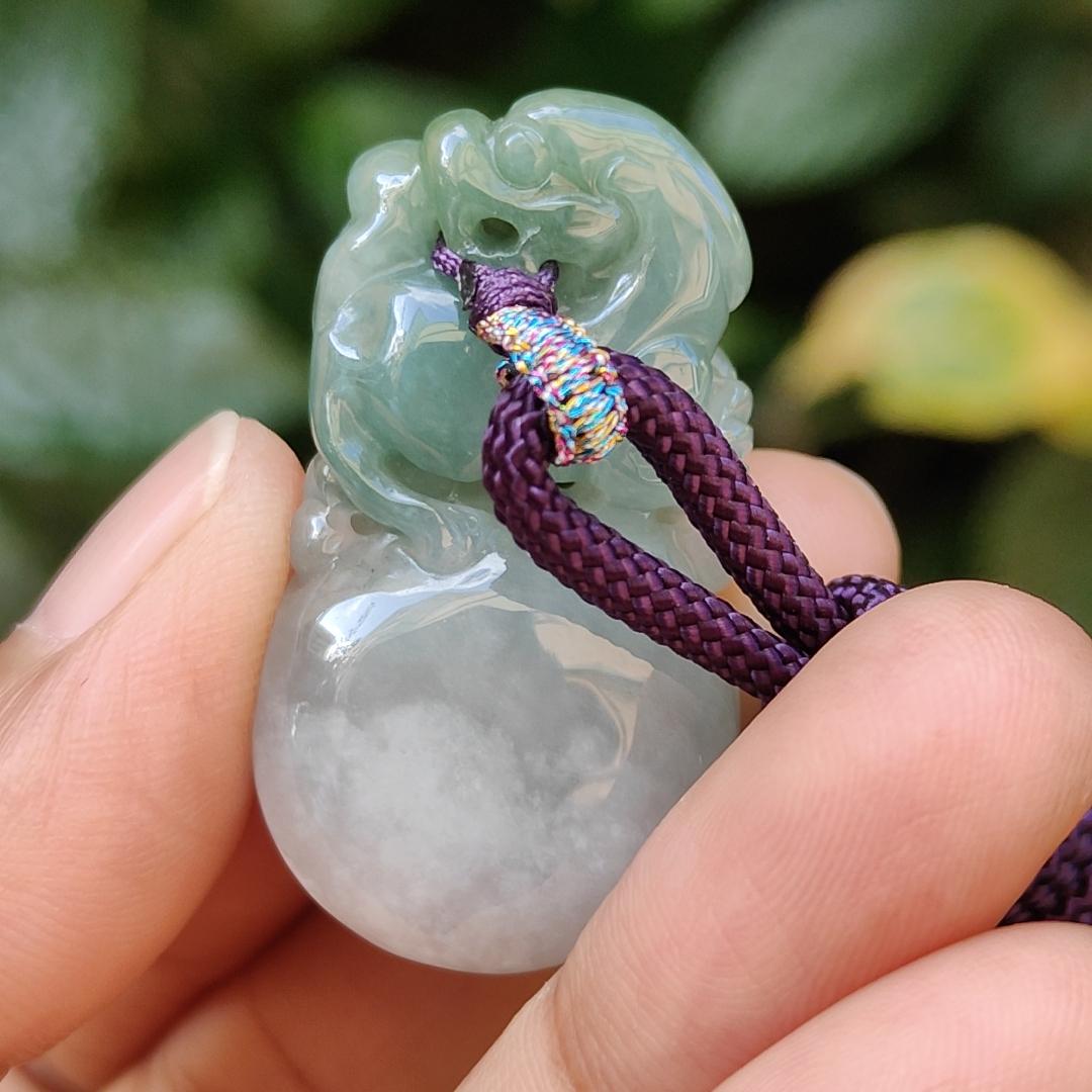 Light Green Natural Type A Jadeite Jade crafted with Lion as Pendant certificate weighs 14.94 grams, measurement 36.6 * 20.5 * 10.8 mm (pendant249) Yi Pin Qian