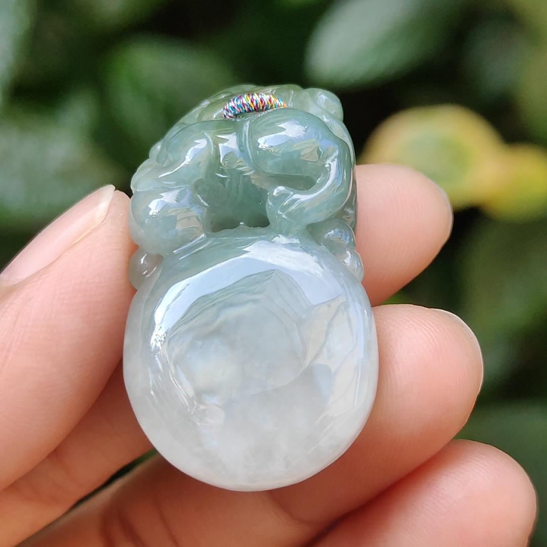 Light Green Natural Type A Jadeite Jade crafted with Lion as Pendant certificate weighs 14.94 grams, measurement 36.6 * 20.5 * 10.8 mm (pendant249) Yi Pin Qian