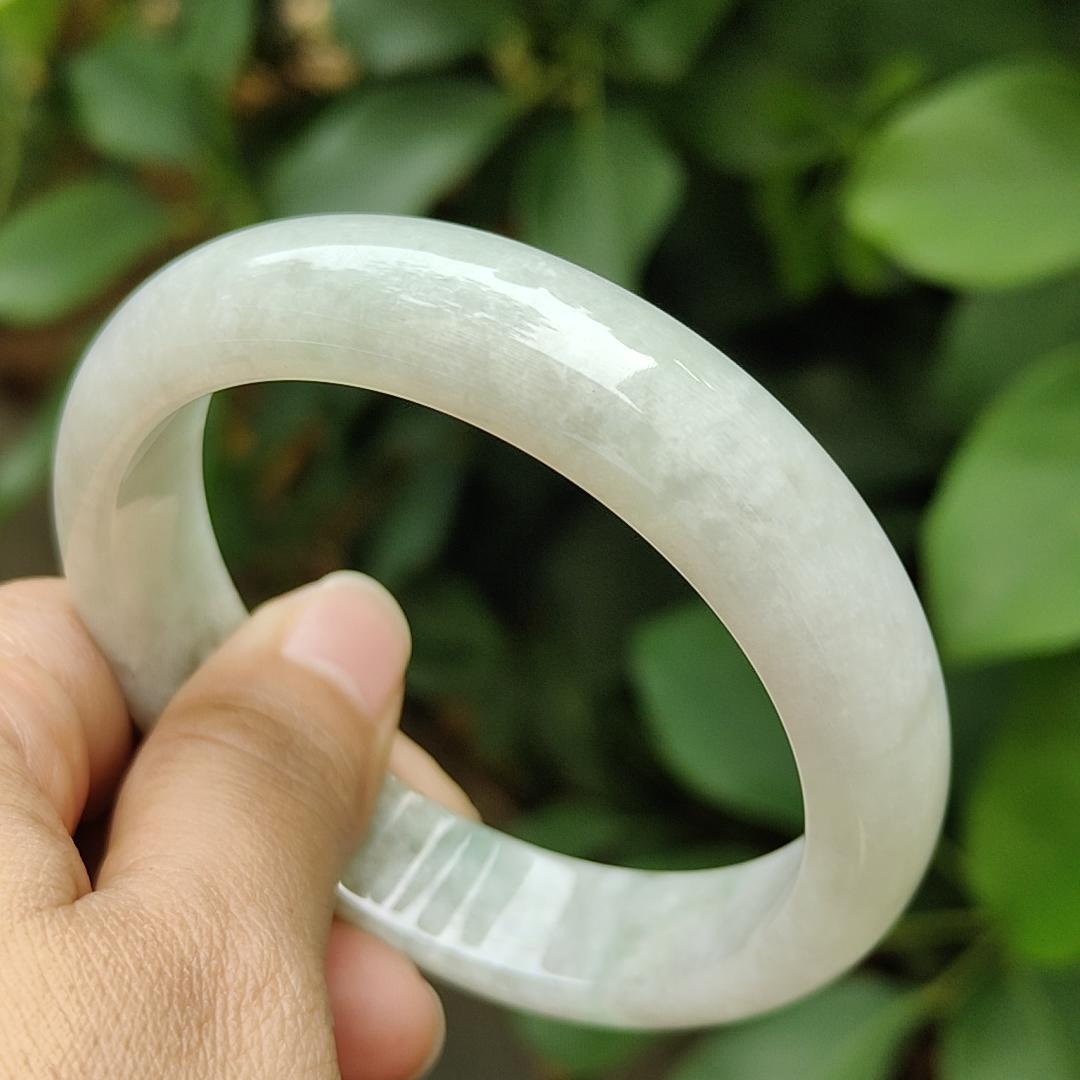 57.7 mm Crafted as Peace bangle on Burmese with light green hue and brown Natural Type A Jadeite Jade, certificate weighs 60.36 grams, Width 14mm, Thickness 7.5mm (bangle17) Yi Pin Qian Jadeites Jade Jewelry ~Your Precious Quintessential ~ Singapore