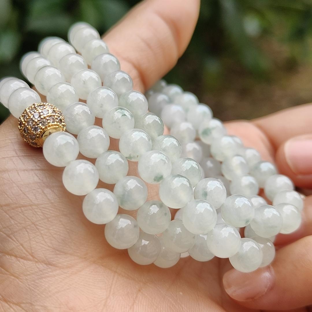 Premium Icy Translucent with Light Green patches Natural Type A Jadeite Jade crafted with 108 * 6.5 mm beads as Bracelet or Necklace, certificate weighs 52.19 grams (bracelet25) Yi Pin Qian