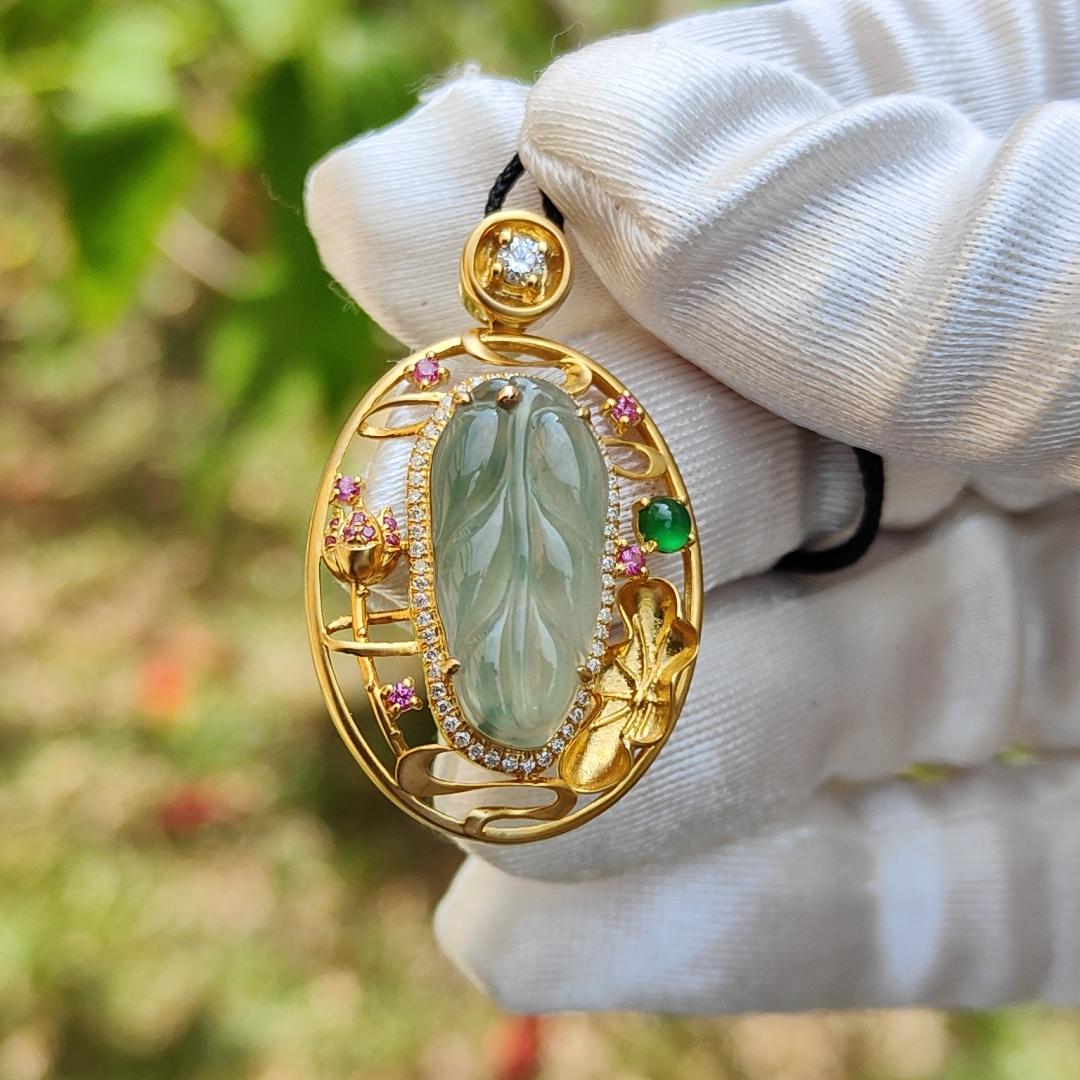 Premium Quality Icy light green with patches Natural Type A Jadeite Jade crafted as Leaf set on 18k Gold with 1 Green Cabochon and Diamonds, Certificate included weigh 4.36 grams, Measurement 35.3 * 22 * 8.2 mm (18kp25) Yi Pin Qian
