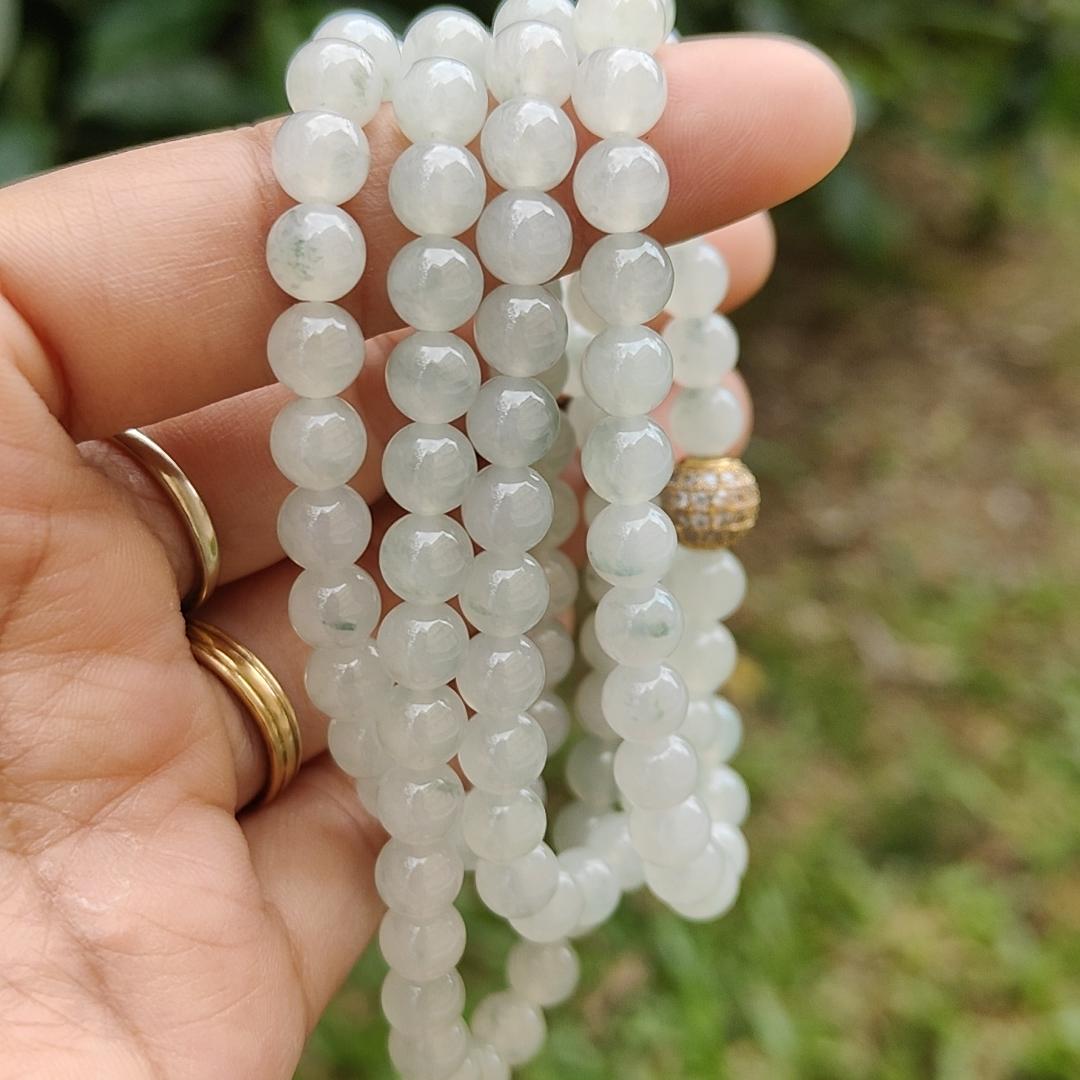 Premium Icy Translucent with Light Green patches Natural Type A Jadeite Jade crafted with 108 * 6.5 mm beads as Bracelet or Necklace, certificate weighs 52.19 grams (bracelet25) Yi Pin Qian
