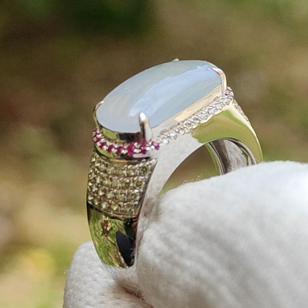 Premium Quality Light Lavender Natural Type A Jadeite Jade crafted as Cabochon 12.8 * 6.7 * 2.8mm, set on 18k Gold with Ruby and Diamonds as Ring, Finger Size 15.5 mm, certificate weigh 3.22 grams (18kring23) Yi Pin Qian