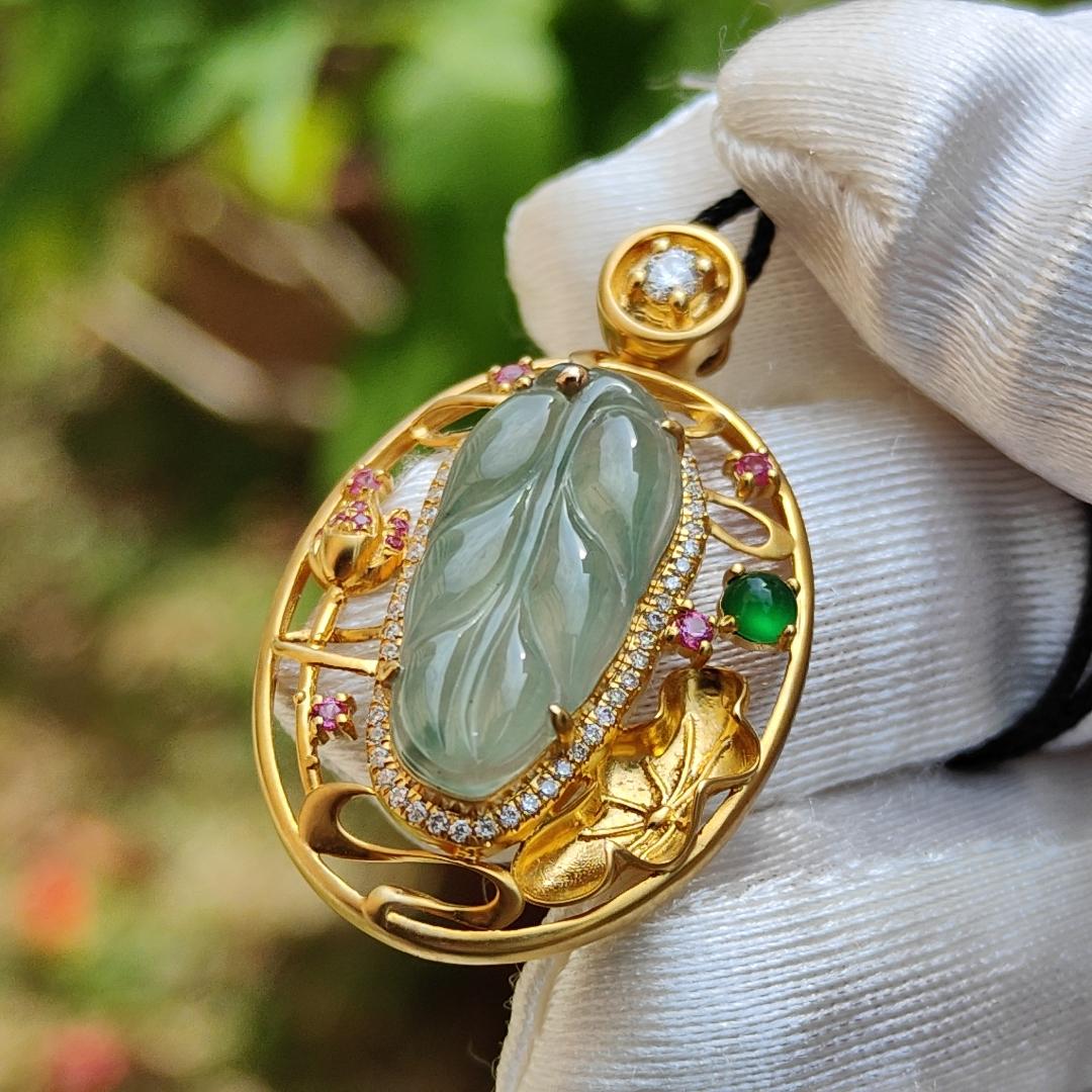 Premium Quality Icy light green with patches Natural Type A Jadeite Jade crafted as Leaf set on 18k Gold with 1 Green Cabochon and Diamonds, Certificate included weigh 4.36 grams, Measurement 35.3 * 22 * 8.2 mm (18kp25) Yi Pin Qian