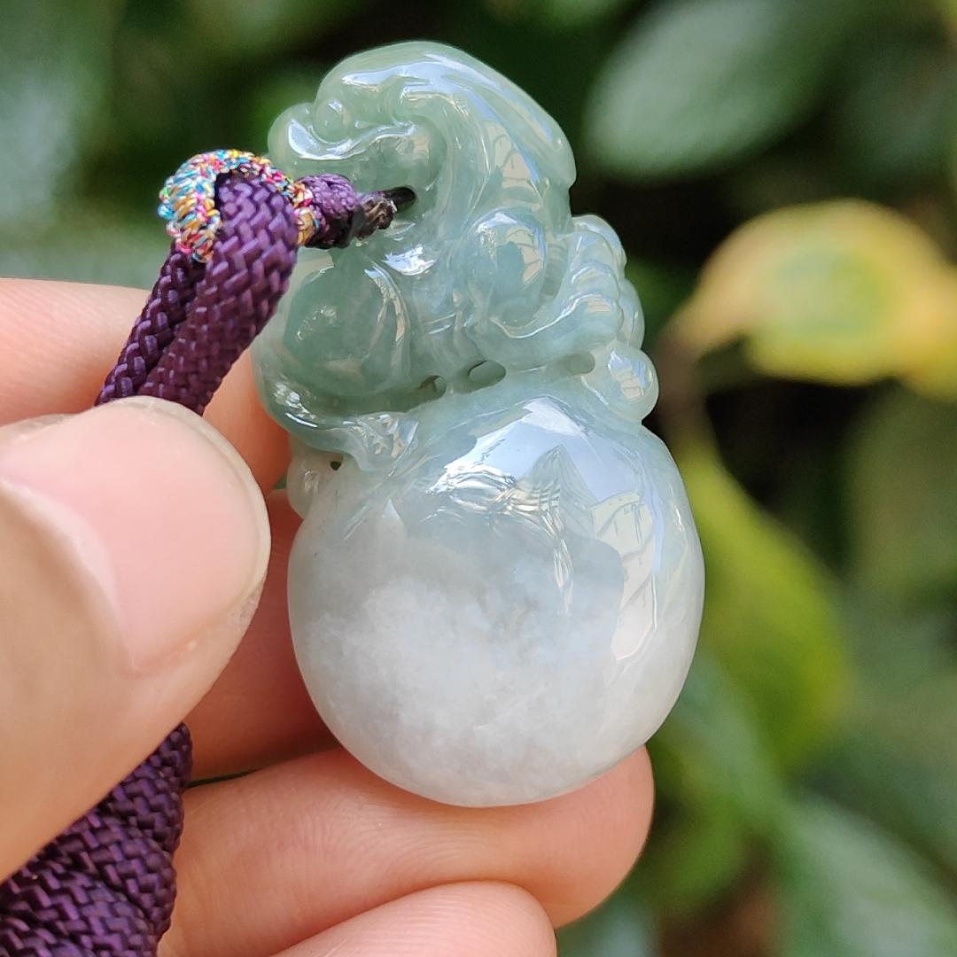 Light Green Natural Type A Jadeite Jade crafted with Lion as Pendant certificate weighs 14.94 grams, measurement 36.6 * 20.5 * 10.8 mm (pendant249) Yi Pin Qian