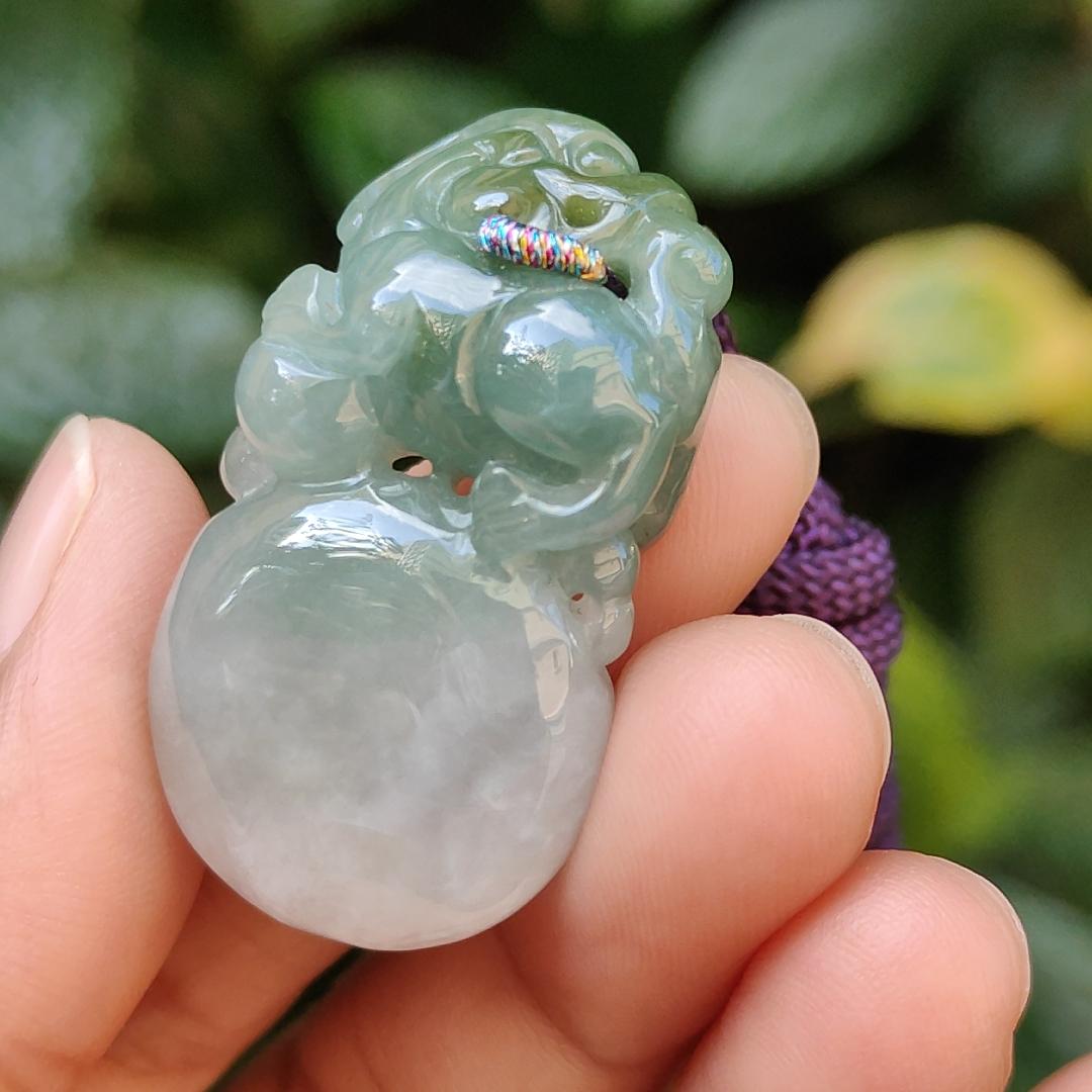 Light Green Natural Type A Jadeite Jade crafted with Lion as Pendant certificate weighs 14.94 grams, measurement 36.6 * 20.5 * 10.8 mm (pendant249) Yi Pin Qian