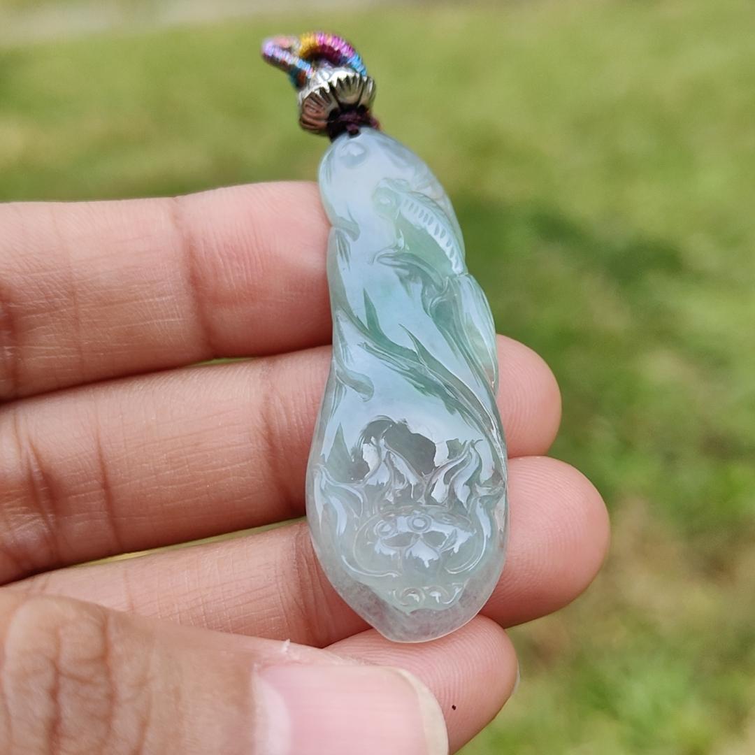 Icy Light Green Natural Type A Jadeite Jade Pendant Crafted with Fish and Lotus, certificate weigh 6.07 grams, measurement 46.3 * 15.8 * 5.5 mm (pendant191) Yi Pin Qian