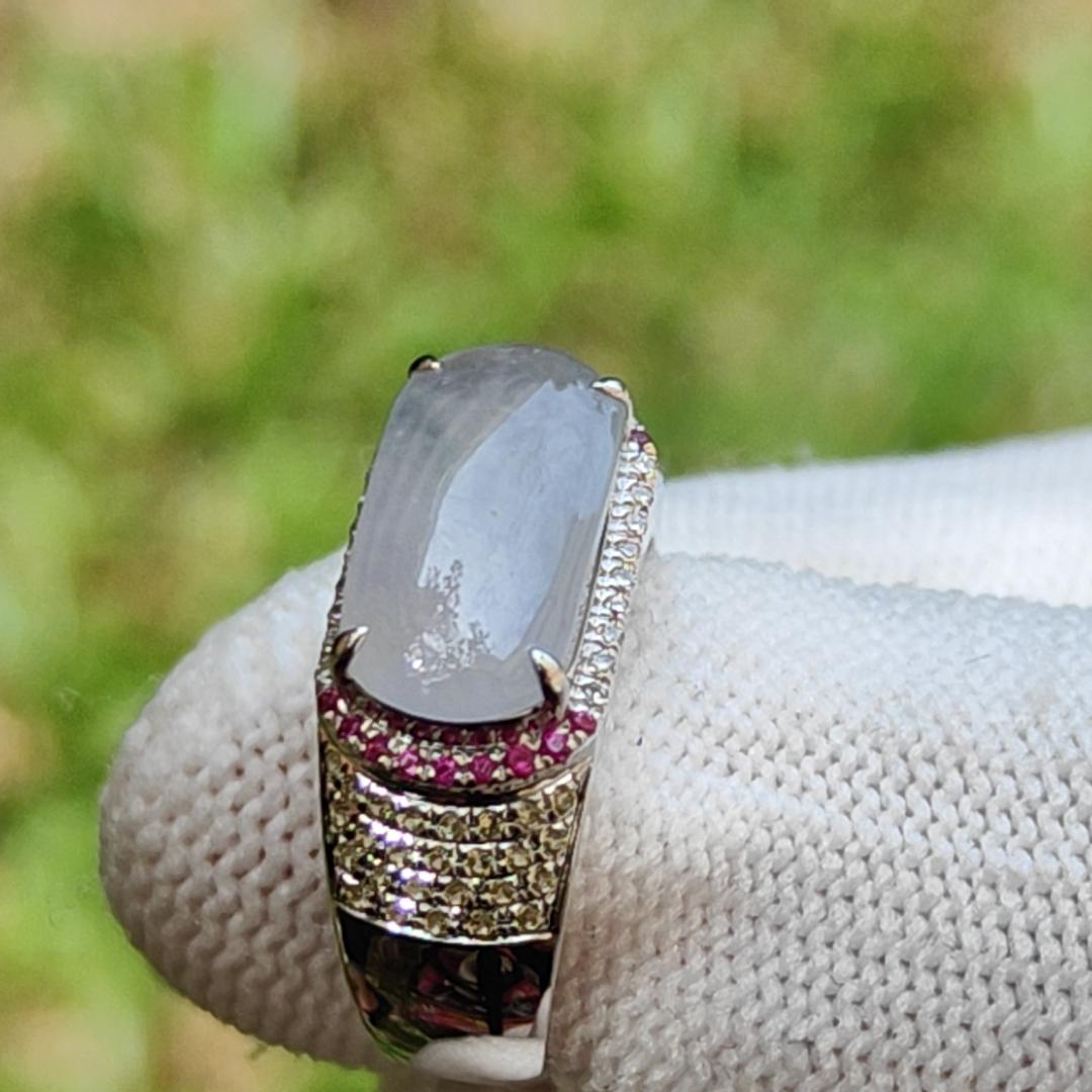 Premium Quality Light Lavender Natural Type A Jadeite Jade crafted as Cabochon 12.8 * 6.7 * 2.8mm, set on 18k Gold with Ruby and Diamonds as Ring, Finger Size 15.5 mm, certificate weigh 3.22 grams (18kring23) Yi Pin Qian