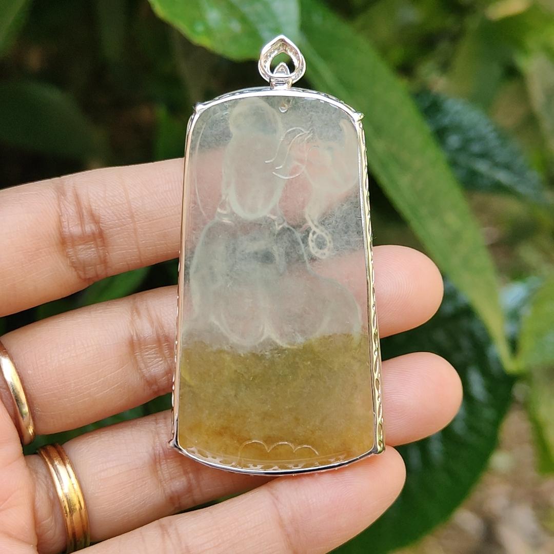 Icy Yellow Natural Type A Jadeite Jade crafted with Guanyin Seating on Lotus set with 18k gold and diamonds, certificate included weigh 18.11 grams, measurement 63.6 * 32 * 8.3 mm (18kp12) Yi Pin Qian
