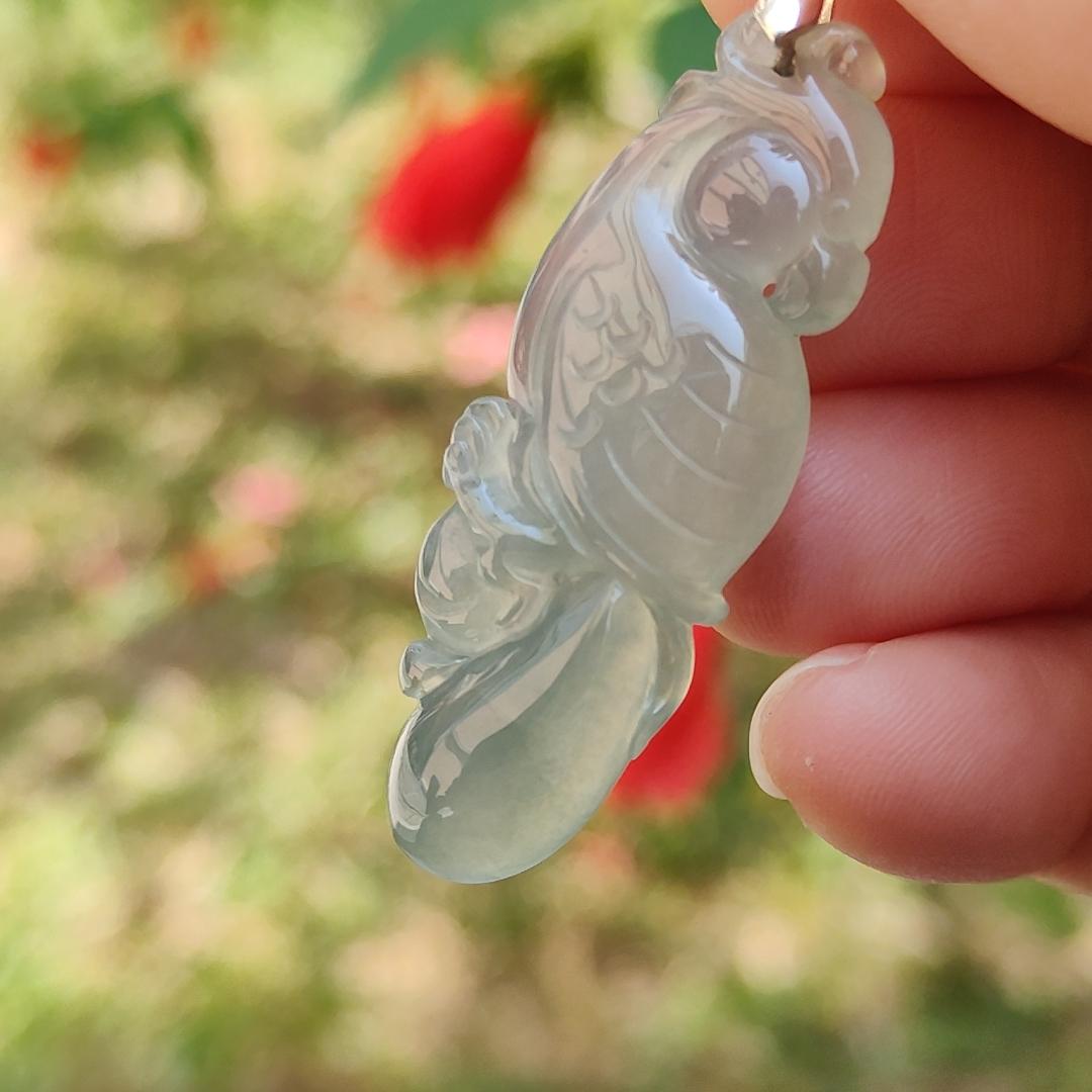 Premium Old Pit Rare Green Hue Icy Translucent Natural Type A Jadeite Jade crafted with Parrot as Pendant for the collectors, certificate weigh 6.25 grams, measurement 41.6 * 15.2 * 6.5 mm (pendant213) Yi Pin Qian