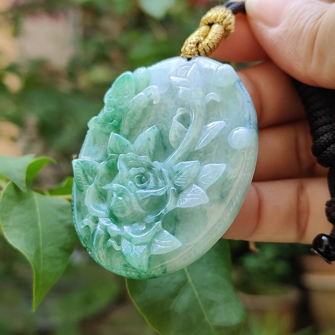 Green with green patches Natural Type A Jadeite Pendant carved with Butterfly and flowers represents Sweet Love with happy marriage, wealthy with flowers blooming and mutual love, certificate weigh 26.02 g, 49.3 * 40.6 * 6.8 mm (pendant84) Yi Pin Qian