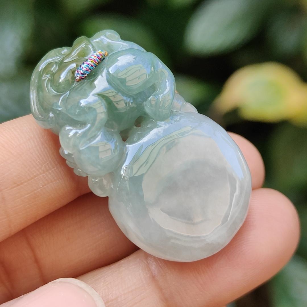 Light Green Natural Type A Jadeite Jade crafted with Lion as Pendant certificate weighs 14.94 grams, measurement 36.6 * 20.5 * 10.8 mm (pendant249) Yi Pin Qian