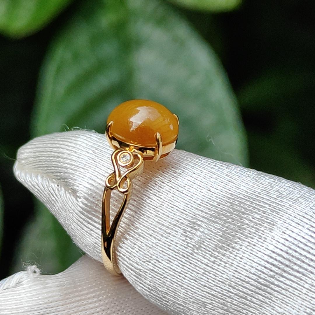 Yellow with a bit reddish Natural Type A Jadeite Jade Cabochon 8.6 * 7 * 3.6 mm set on 18k Gold as Ring adding 2 diamonds with certificate weigh 2.08 grams, finger size 16.8 mm (18kring13) Yi Pin Qian