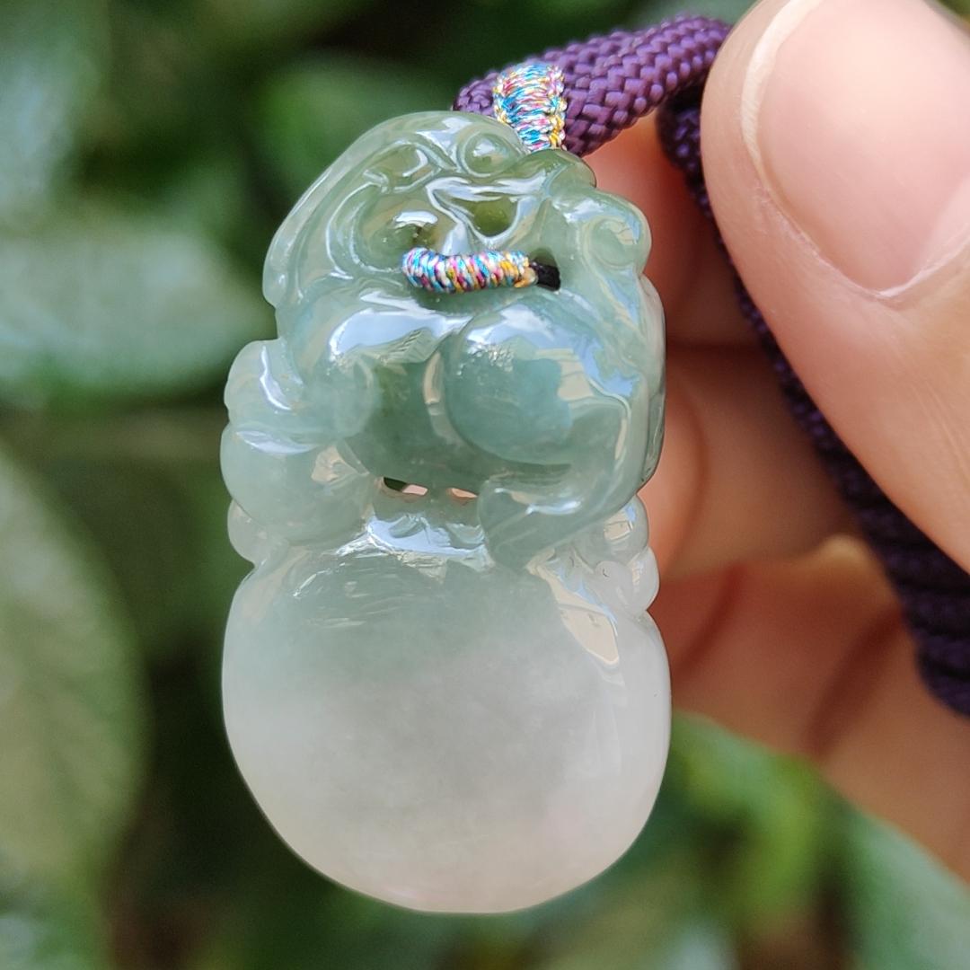 Light Green Natural Type A Jadeite Jade crafted with Lion as Pendant certificate weighs 14.94 grams, measurement 36.6 * 20.5 * 10.8 mm (pendant249) Yi Pin Qian