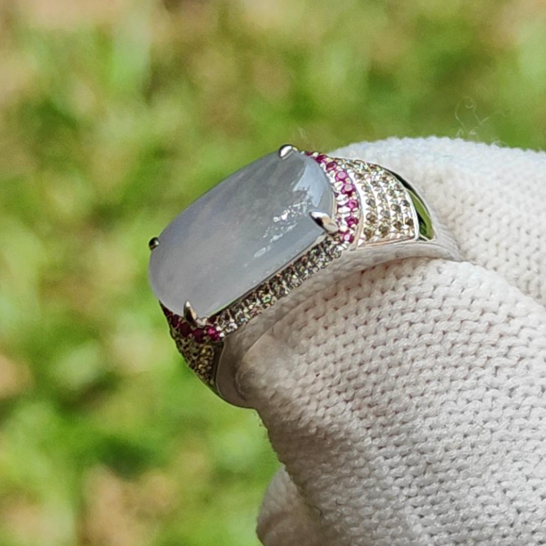 Premium Quality Light Lavender Natural Type A Jadeite Jade crafted as Cabochon 12.8 * 6.7 * 2.8mm, set on 18k Gold with Ruby and Diamonds as Ring, Finger Size 15.5 mm, certificate weigh 3.22 grams (18kring23) Yi Pin Qian