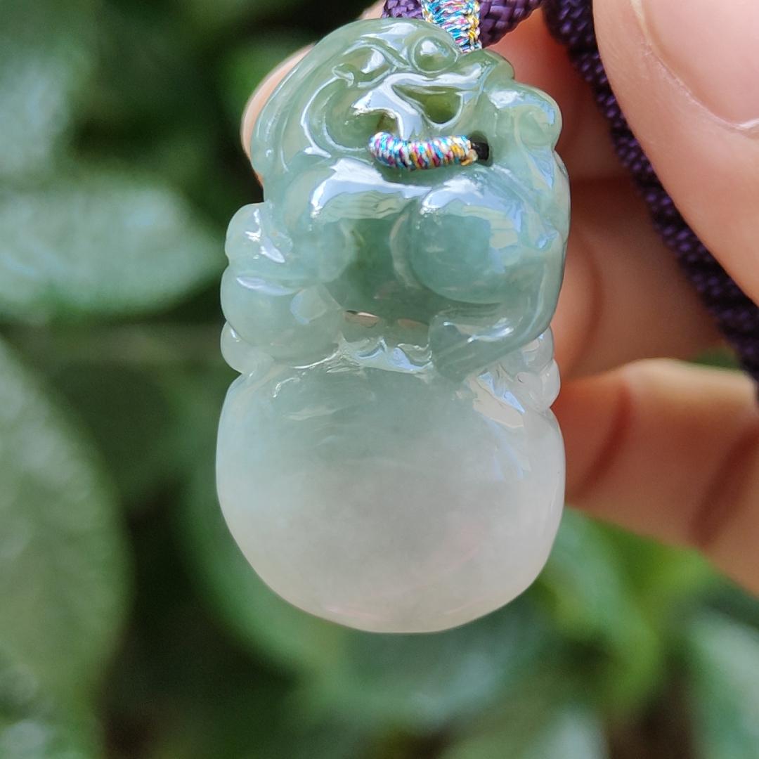Light Green Natural Type A Jadeite Jade crafted with Lion as Pendant certificate weighs 14.94 grams, measurement 36.6 * 20.5 * 10.8 mm (pendant249) Yi Pin Qian