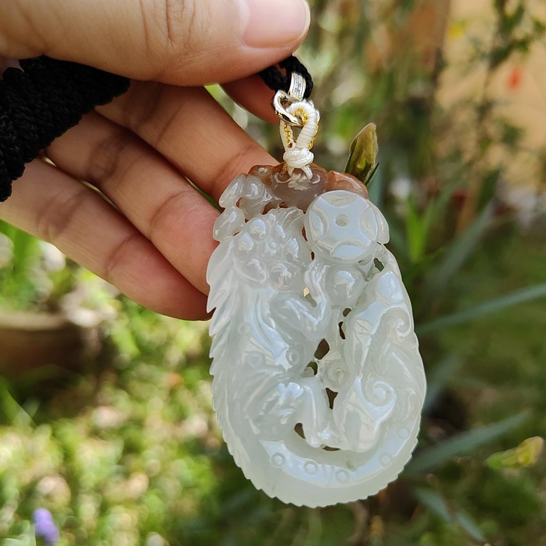 Carved with lizard, bat, peanut, coin and ruyi Natural Type A Jadeite Pendant with NGI Gemstone report weight 136.84 grams, 57.10 * 34.08 * 10.68 mm, Translucent near colorless with reddish brown patch, another good collection for collector (pendant132) Yi Pin Qian