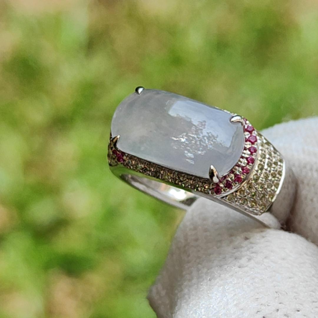 Premium Quality Light Lavender Natural Type A Jadeite Jade crafted as Cabochon 12.8 * 6.7 * 2.8mm, set on 18k Gold with Ruby and Diamonds as Ring, Finger Size 15.5 mm, certificate weigh 3.22 grams (18kring23) Yi Pin Qian