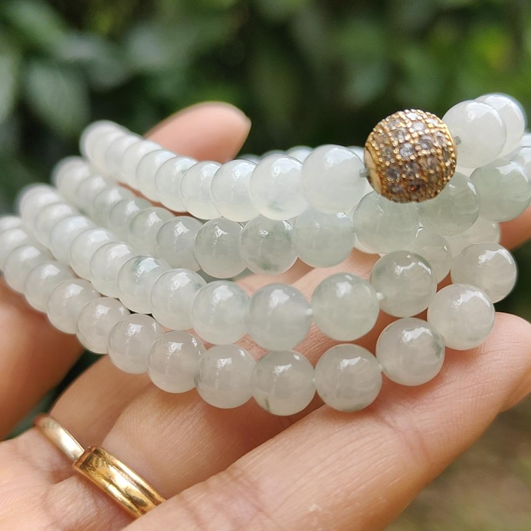 Premium Icy Translucent with Light Green patches Natural Type A Jadeite Jade crafted with 108 * 6.5 mm beads as Bracelet or Necklace, certificate weighs 52.19 grams (bracelet25) Yi Pin Qian