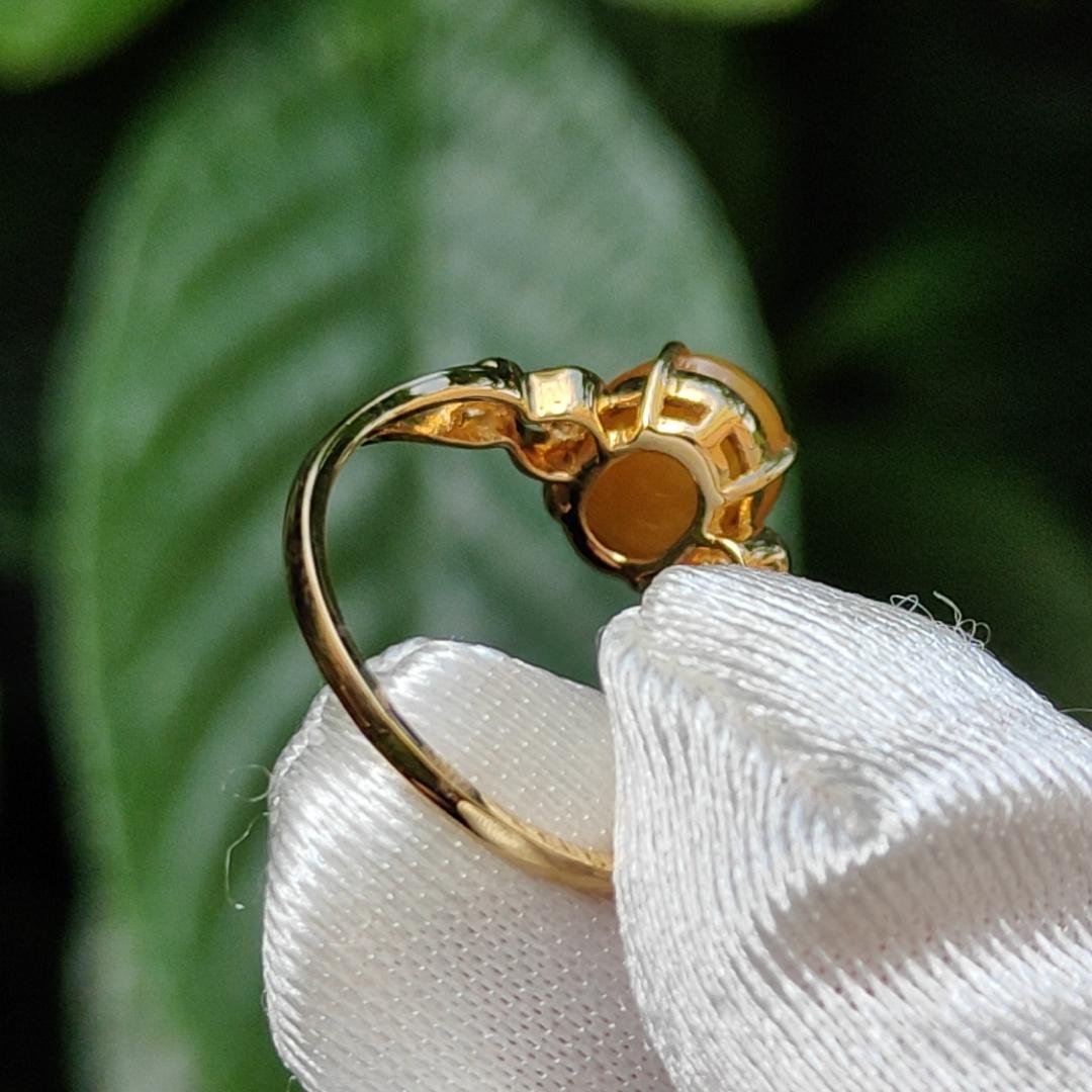Yellow with a bit reddish Natural Type A Jadeite Jade Cabochon 8.6 * 7 * 3.6 mm set on 18k Gold as Ring adding 2 diamonds with certificate weigh 2.08 grams, finger size 16.8 mm (18kring13) Yi Pin Qian