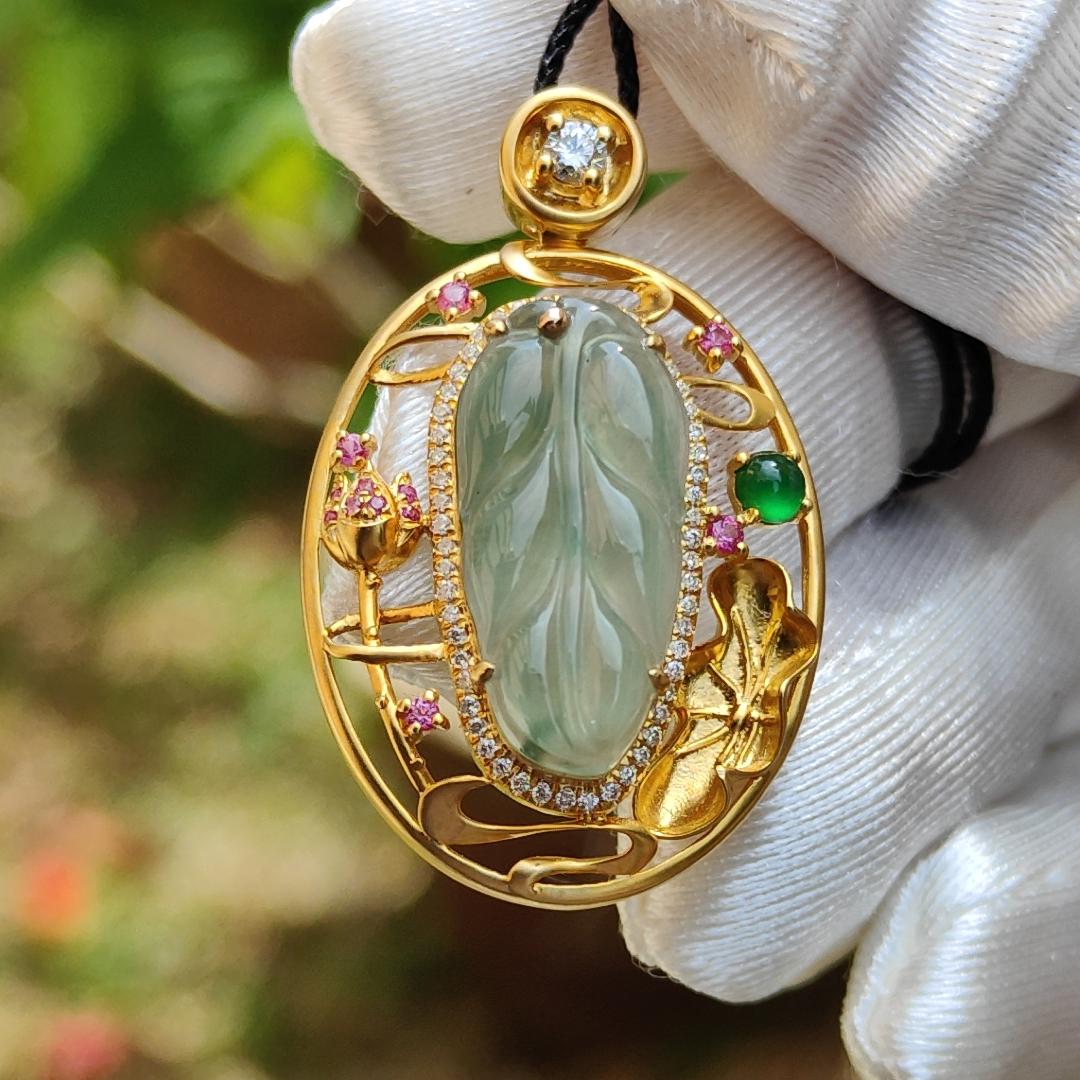 Premium Quality Icy light green with patches Natural Type A Jadeite Jade crafted as Leaf set on 18k Gold with 1 Green Cabochon and Diamonds, Certificate included weigh 4.36 grams, Measurement 35.3 * 22 * 8.2 mm (18kp25) Yi Pin Qian