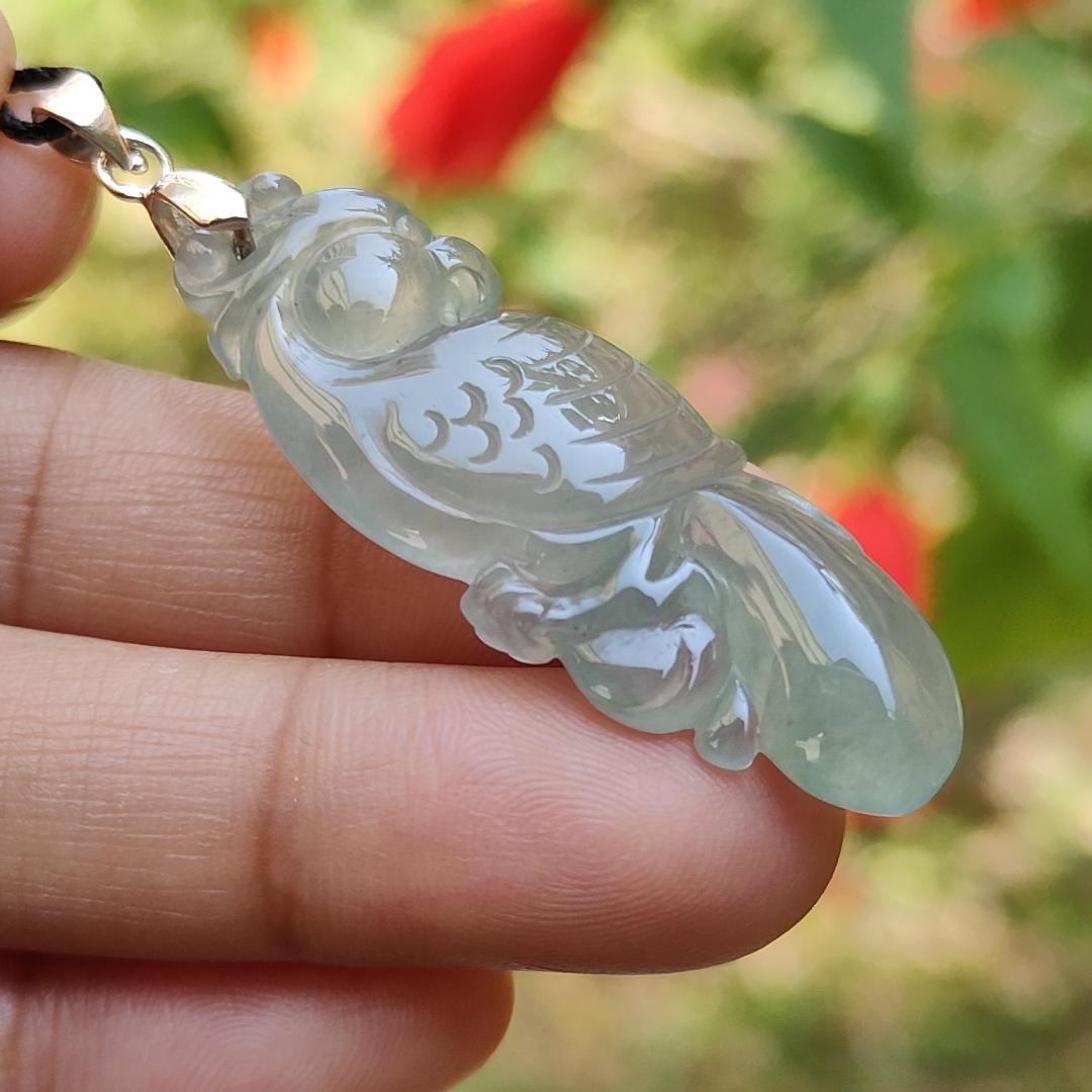 Premium Old Pit Rare Green Hue Icy Translucent Natural Type A Jadeite Jade crafted with Parrot as Pendant for the collectors, certificate weigh 6.25 grams, measurement 41.6 * 15.2 * 6.5 mm (pendant213) Yi Pin Qian