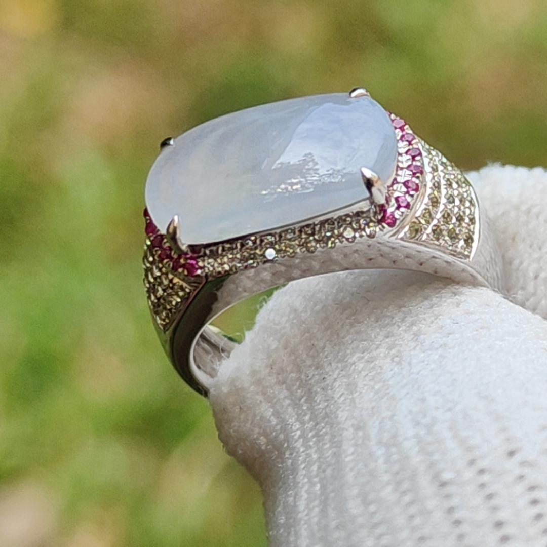 Premium Quality Light Lavender Natural Type A Jadeite Jade crafted as Cabochon 12.8 * 6.7 * 2.8mm, set on 18k Gold with Ruby and Diamonds as Ring, Finger Size 15.5 mm, certificate weigh 3.22 grams (18kring23) Yi Pin Qian