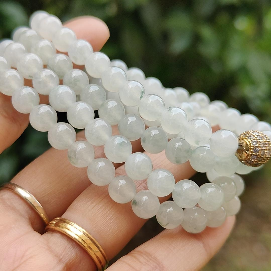Premium Icy Translucent with Light Green patches Natural Type A Jadeite Jade crafted with 108 * 6.5 mm beads as Bracelet or Necklace, certificate weighs 52.19 grams (bracelet25) Yi Pin Qian