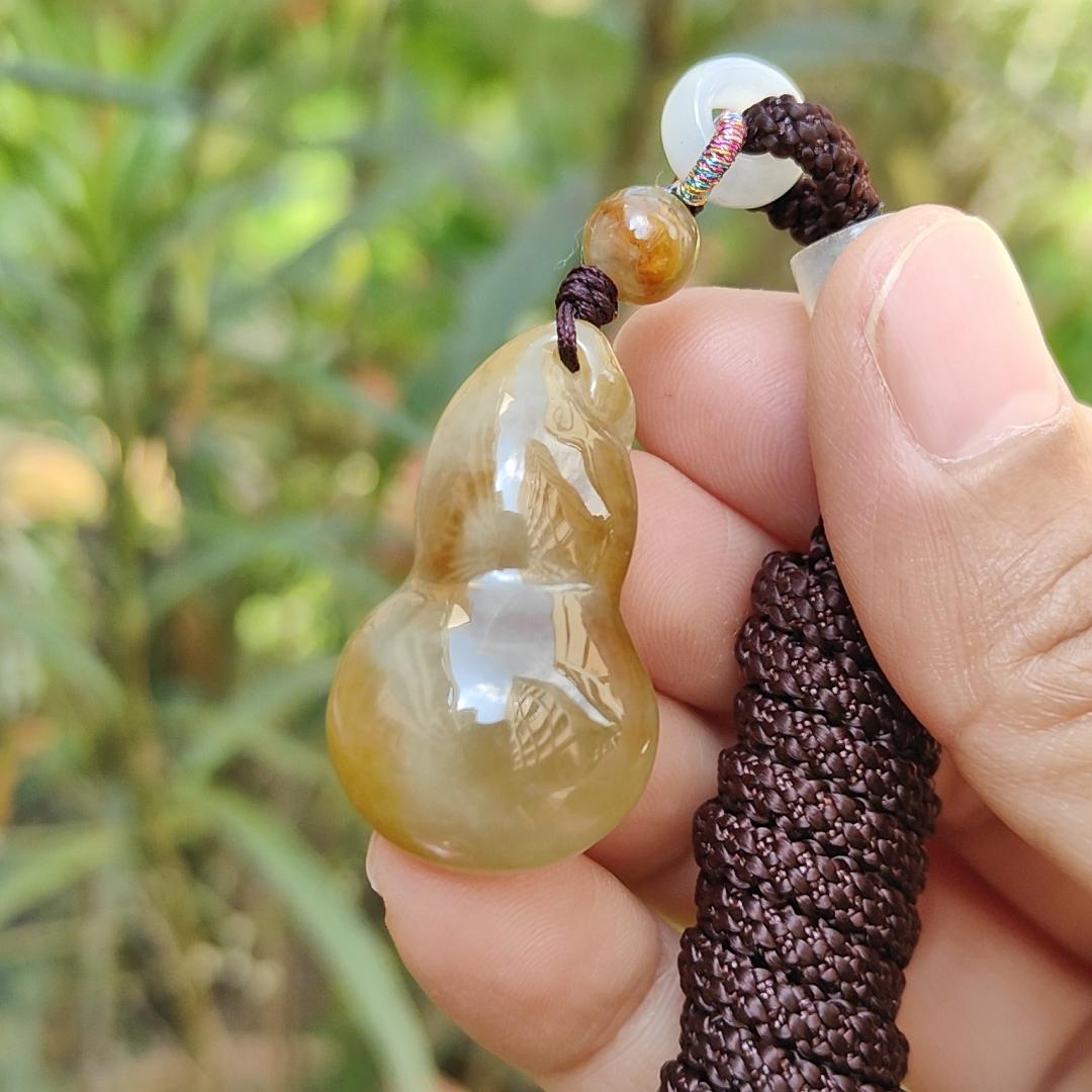 Premium Semi Icy Yellow Natural Type A Jadeite Pendant Necklace crafted as a gourd, symbols of Happiness, wealth, longevity, with certificate weigh 9.16 grams, 32.6 * 18.7 * 10.3 mm, suitable for daily wear or collection purpose Yi Pin Qian
