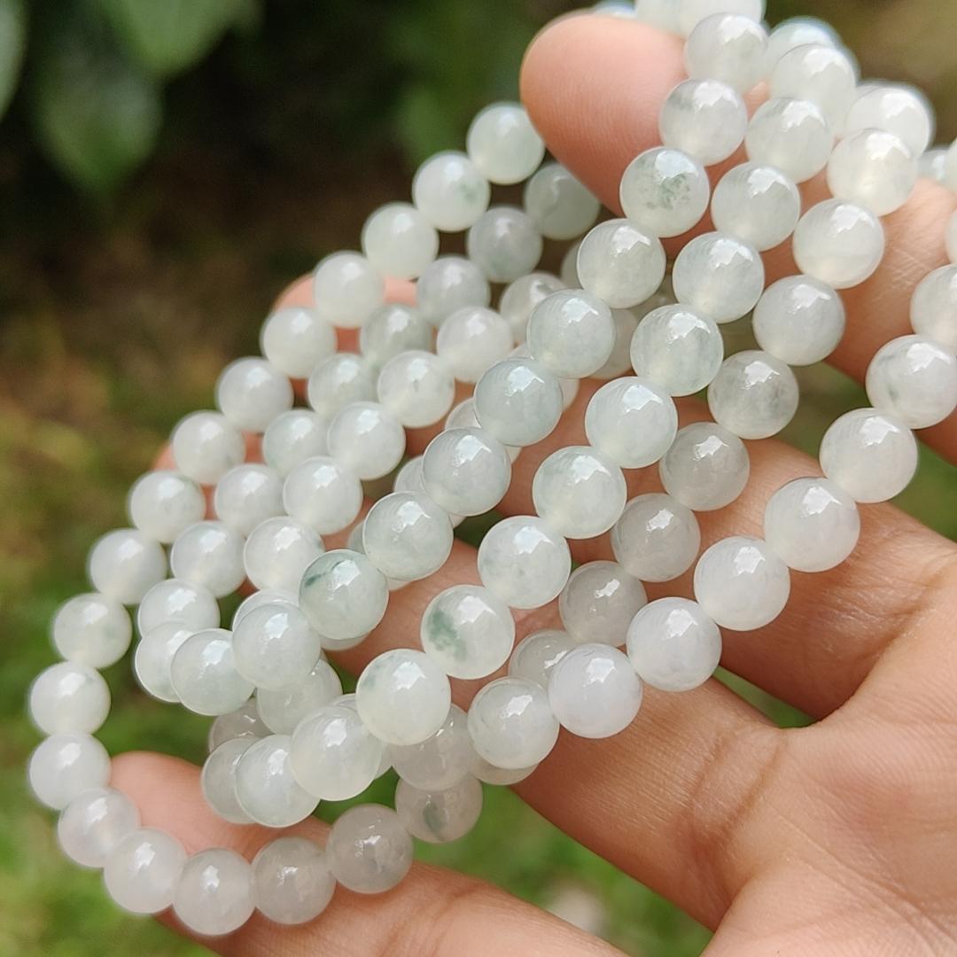 Premium Icy Translucent with Light Green patches Natural Type A Jadeite Jade crafted with 108 * 6.5 mm beads as Bracelet or Necklace, certificate weighs 52.19 grams (bracelet25) Yi Pin Qian