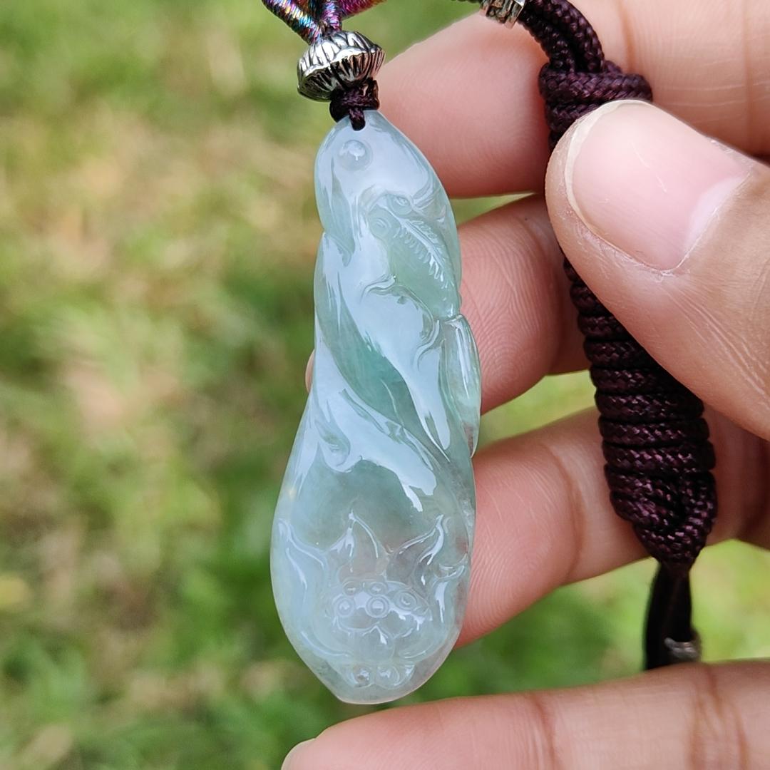 Icy Light Green Natural Type A Jadeite Jade Pendant Crafted with Fish and Lotus, certificate weigh 6.07 grams, measurement 46.3 * 15.8 * 5.5 mm (pendant191) Yi Pin Qian