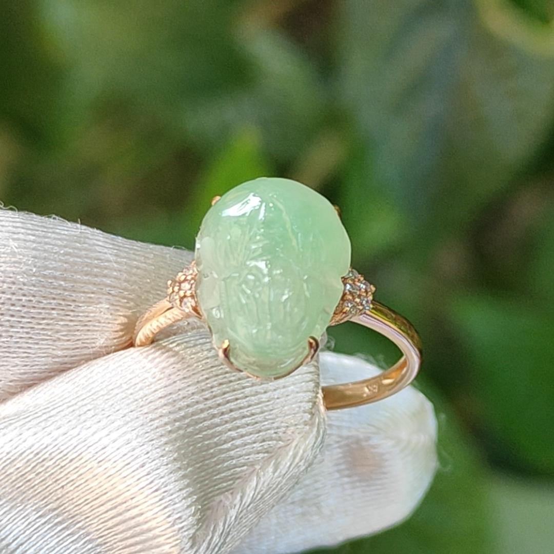 Good Quality Natural Type A Jadeite Jade crafted with light green pixiu set on 18k gold as Ring with certificate weighs 2.58 grams, measurement 12.1 * 9.6 * 5.3 mm (18kring24) Yi Pin Qian