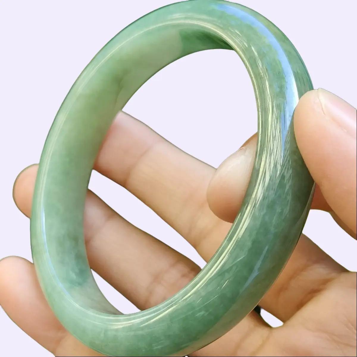 Peace Bangle Bracelet Size 55.5 mm on Light Green Natural Type A Jadeite Jade, certificate weighs 49.05 grams, Width 11.8 mm Thickness: 7.7 mm (bangle28) Yi Pin Qian Jadeites Jade Jewelry ~Your Precious Quintessential ~ Singapore
