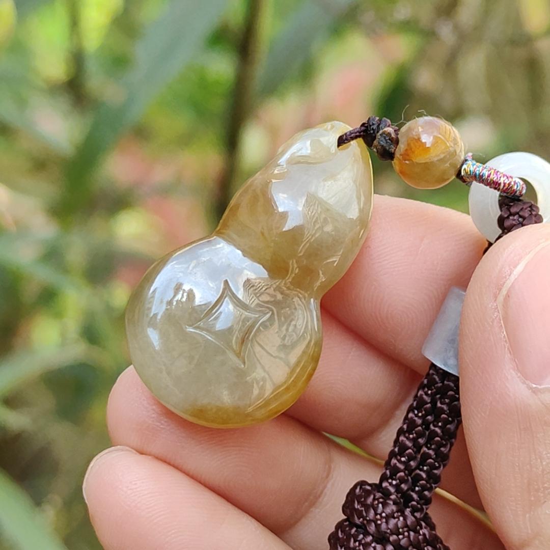 Premium Semi Icy Yellow Natural Type A Jadeite Pendant Necklace crafted as a gourd, symbols of Happiness, wealth, longevity, with certificate weigh 9.16 grams, 32.6 * 18.7 * 10.3 mm, suitable for daily wear or collection purpose Yi Pin Qian
