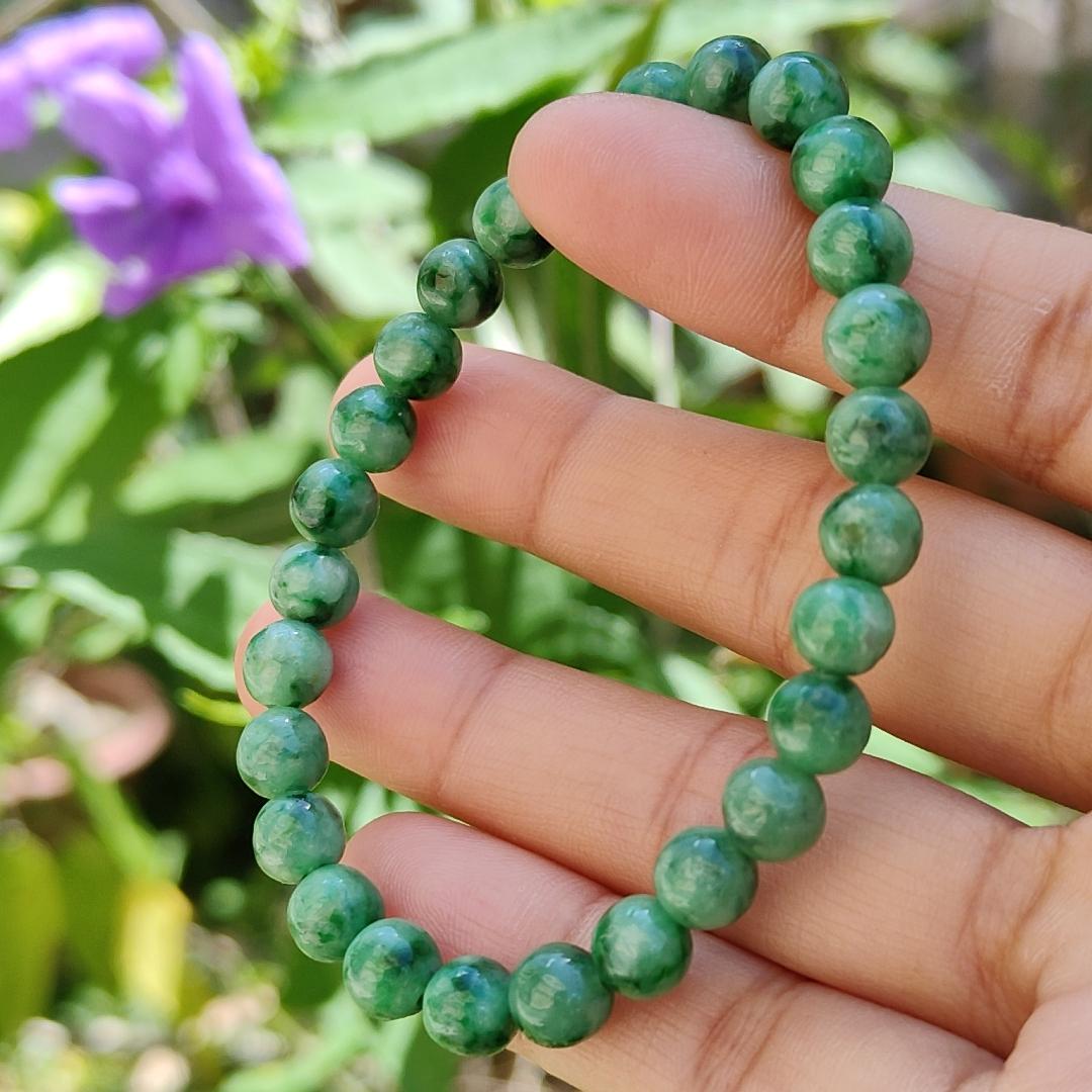 A Stunning daily wear, now with mid year offer, 27 Spicy-Green Beads measurement at 6.7 mm Natural Type A Jadeite Bracelet come with QIC approved labs certificate weigh 13.75 grams, suitable for your daily wear or collections (bracelet2) Yi Pin Qian