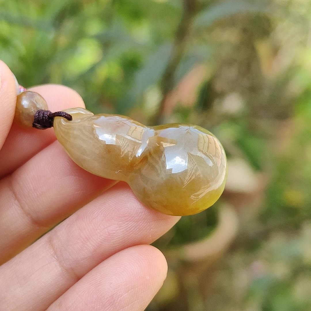 Premium Semi Icy Yellow Natural Type A Jadeite Pendant Necklace crafted as a gourd, symbols of Happiness, wealth, longevity, with certificate weigh 9.16 grams, 32.6 * 18.7 * 10.3 mm, suitable for daily wear or collection purpose Yi Pin Qian