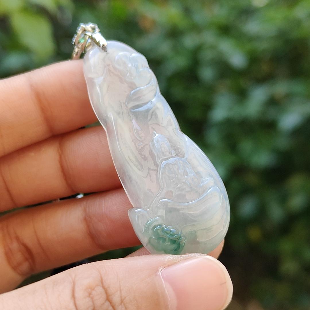 Icy variety Translucent with green Natural Type A Jadeite Pendant Necklace crafted as the faceless buddha with symbols of Holy and blessed blessings of wealth, prosperity and happiness with certificate weigh 11.02 grams, 49.9 * 19.9 * 7 mm (pendant34) Yi Pin Qian