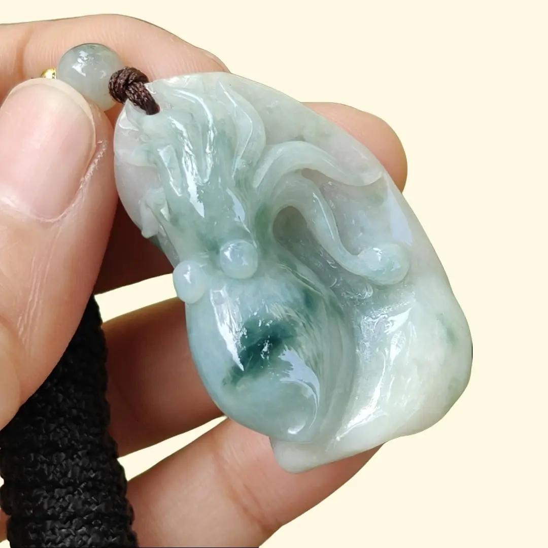 Crafted as Octopus Pendant on Natural Type A Jadeite Jade with rough skin certificate weighs 20.48 grams, measurement 38.6 * 20.3 * 17 mm (pendant354) Yi Pin Qian Jadeites Jade Jewelry ~Your Precious Quintessential ~ Singapore