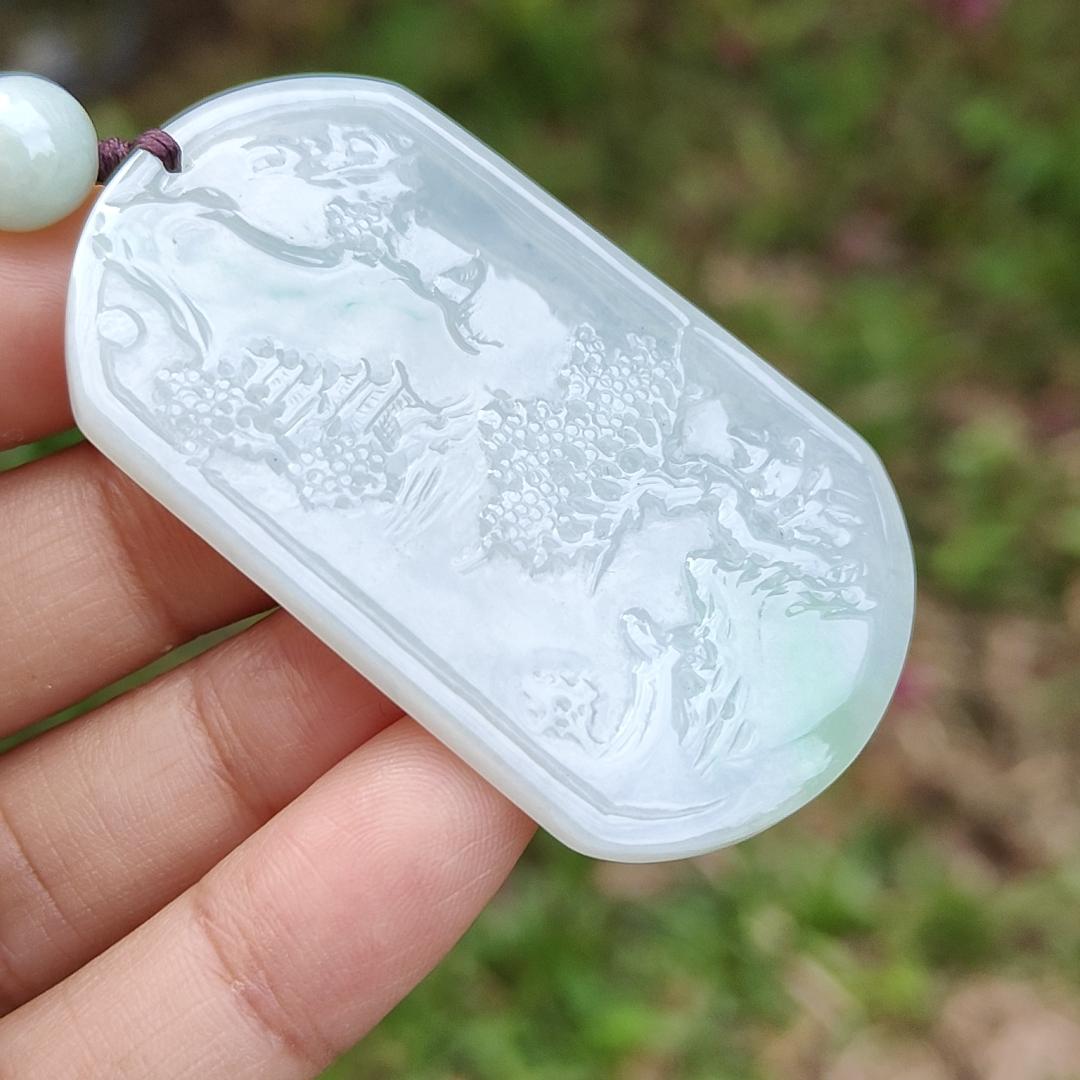 Quality Semi Icy White and Light Green Patches Natural Type A Jadeite Jade crafted with sceneries as pendant with QIC labs approved certificate weigh 24.89 grams, measurement 54 * 32 * 4.5 mm (pendant227) Yi Pin Qian