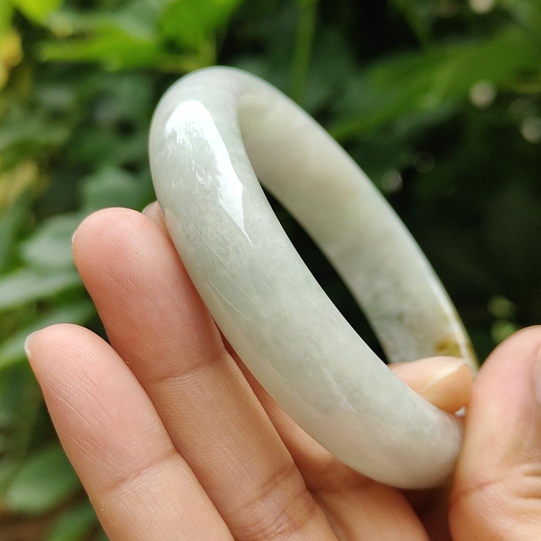 57.7 mm Crafted as Peace bangle on Burmese with light green hue and brown Natural Type A Jadeite Jade, certificate weighs 60.36 grams, Width 14mm, Thickness 7.5mm (bangle17) Yi Pin Qian Jadeites Jade Jewelry ~Your Precious Quintessential ~ Singapore