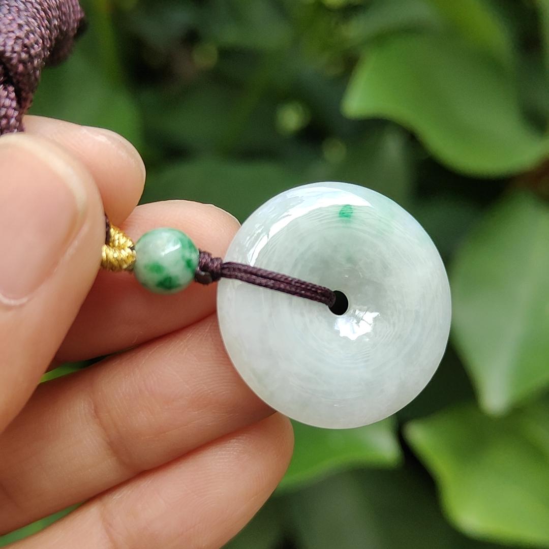 Light Green Hue with a Green Patch crafted as Donut Shape Natural Type A Jadeite-Jade Pendant, certificate weighs 5.61 grams, measurement 24.8 * 4.5 mm (pendant304) Yi Pin Qian Jadeites Jade Jewelry ~Your Precious Quintessential ~ Singapore