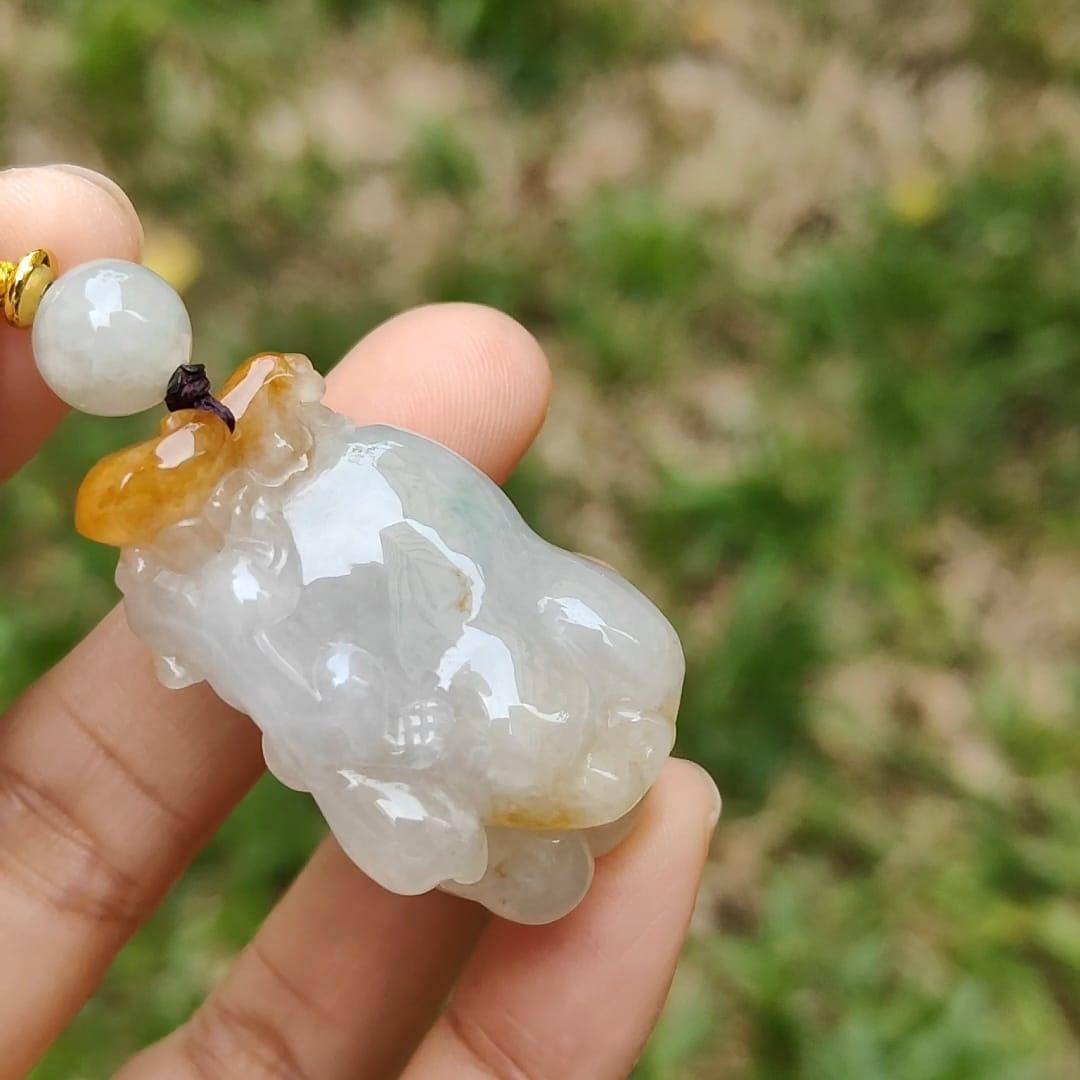 Unique Yellow Ruyi Chayote Natural Type A Jadeite Pendant with QIC approved labs certificate weight 25.27 grams, 40 * 25 * 15.20 mm originate from Myanmar very suitable for daily wear (pendant119) Yi Pin Qian