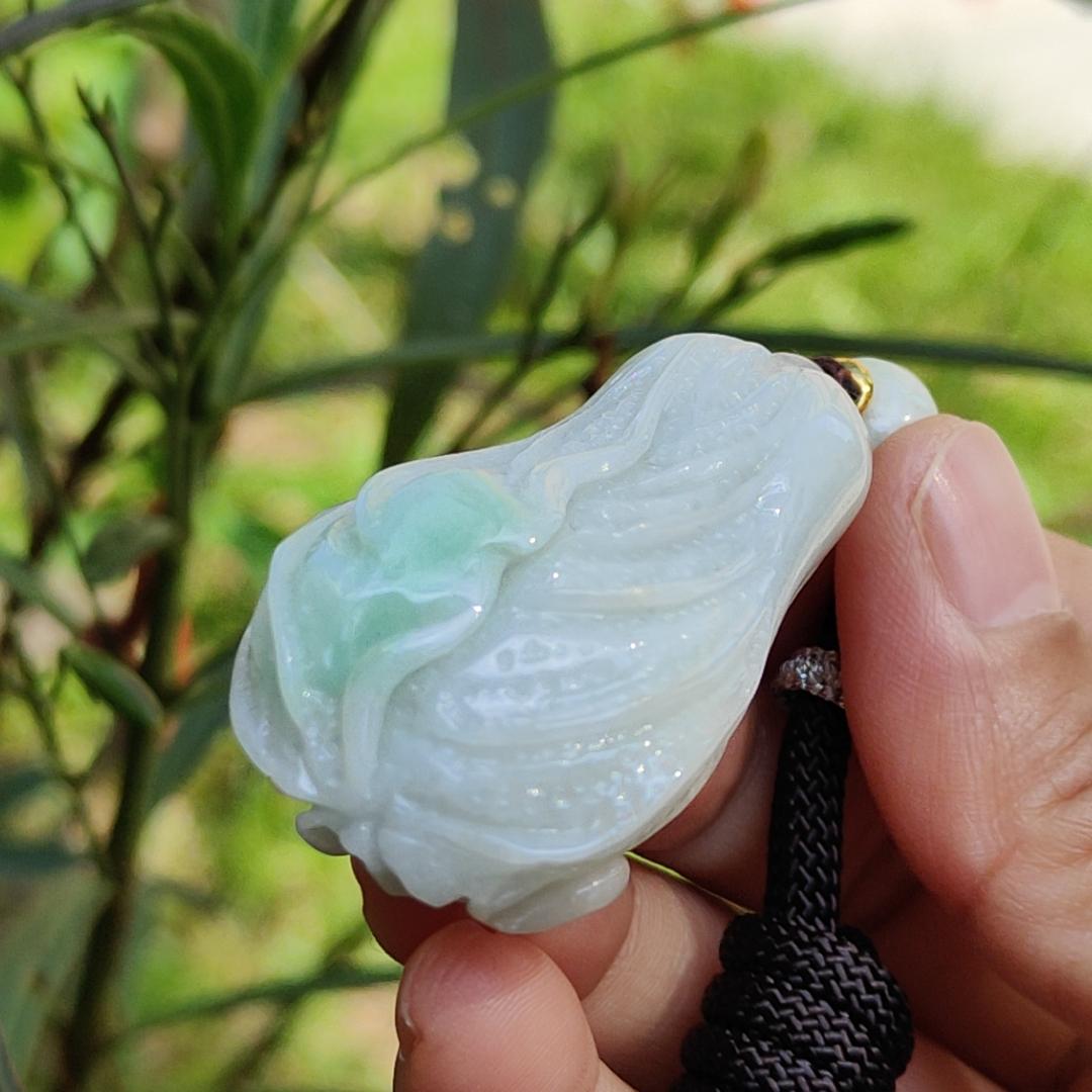 Crafted as Chinese cabbage with patches of light green Natural Type A Jadeite Pendant Necklace with QIC approved labs certificate weigh 31.92 grams, 46.8 * 27.3 * 18 mm, symbols of Boosts wealth, purity, and good weather, suitable for daily wear Yi Pin Qian