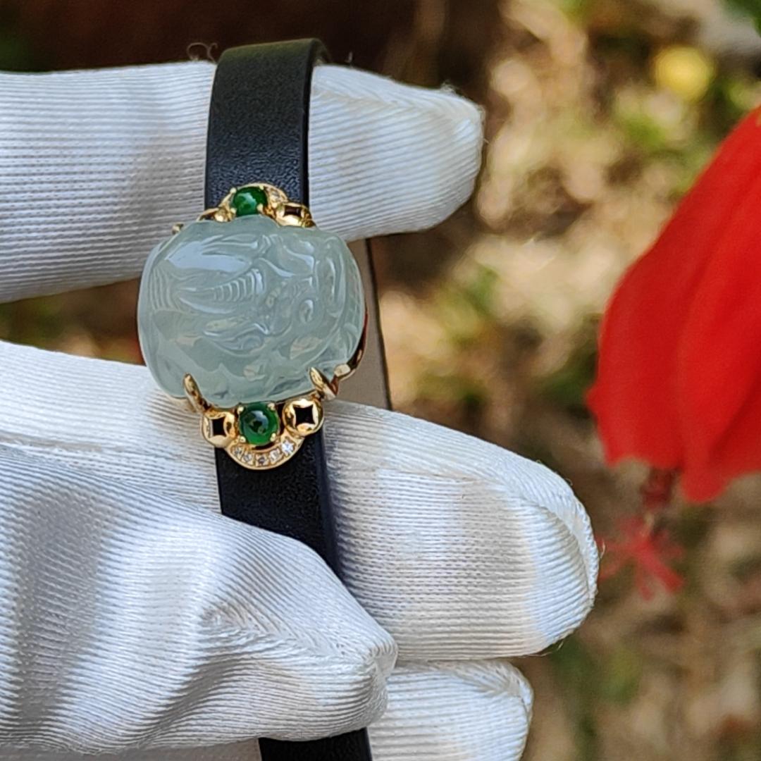 Light Green Hue Natural Type A Jadeite Jade crafted as Pixiu set on 18k Gold with 2 Green Cabochon and diamonds, adding PU wrist band upgraded elegant style bracelet, certificate weigh 4.44 grams, measurement 16.6 * 14.1 * 7.5 mm (18kpw1) Yi Pin Qian