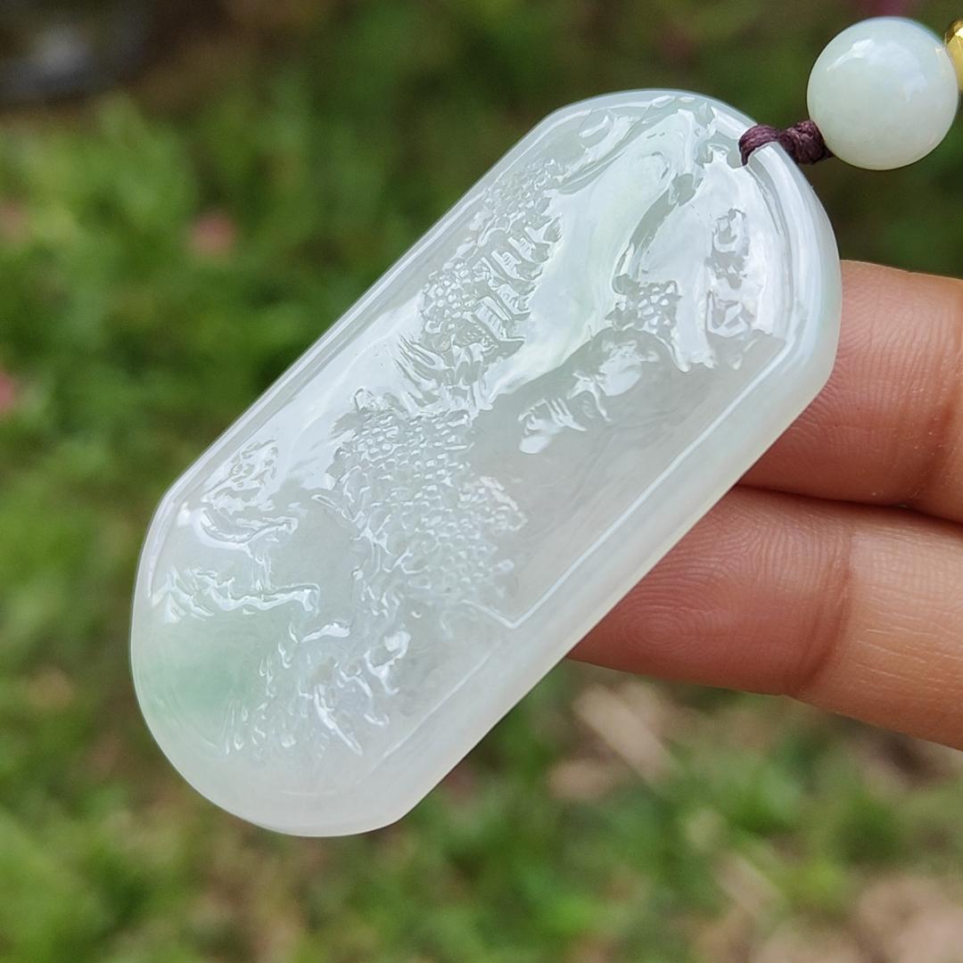 Quality Semi Icy White and Light Green Patches Natural Type A Jadeite Jade crafted with sceneries as pendant with QIC labs approved certificate weigh 24.89 grams, measurement 54 * 32 * 4.5 mm (pendant227) Yi Pin Qian