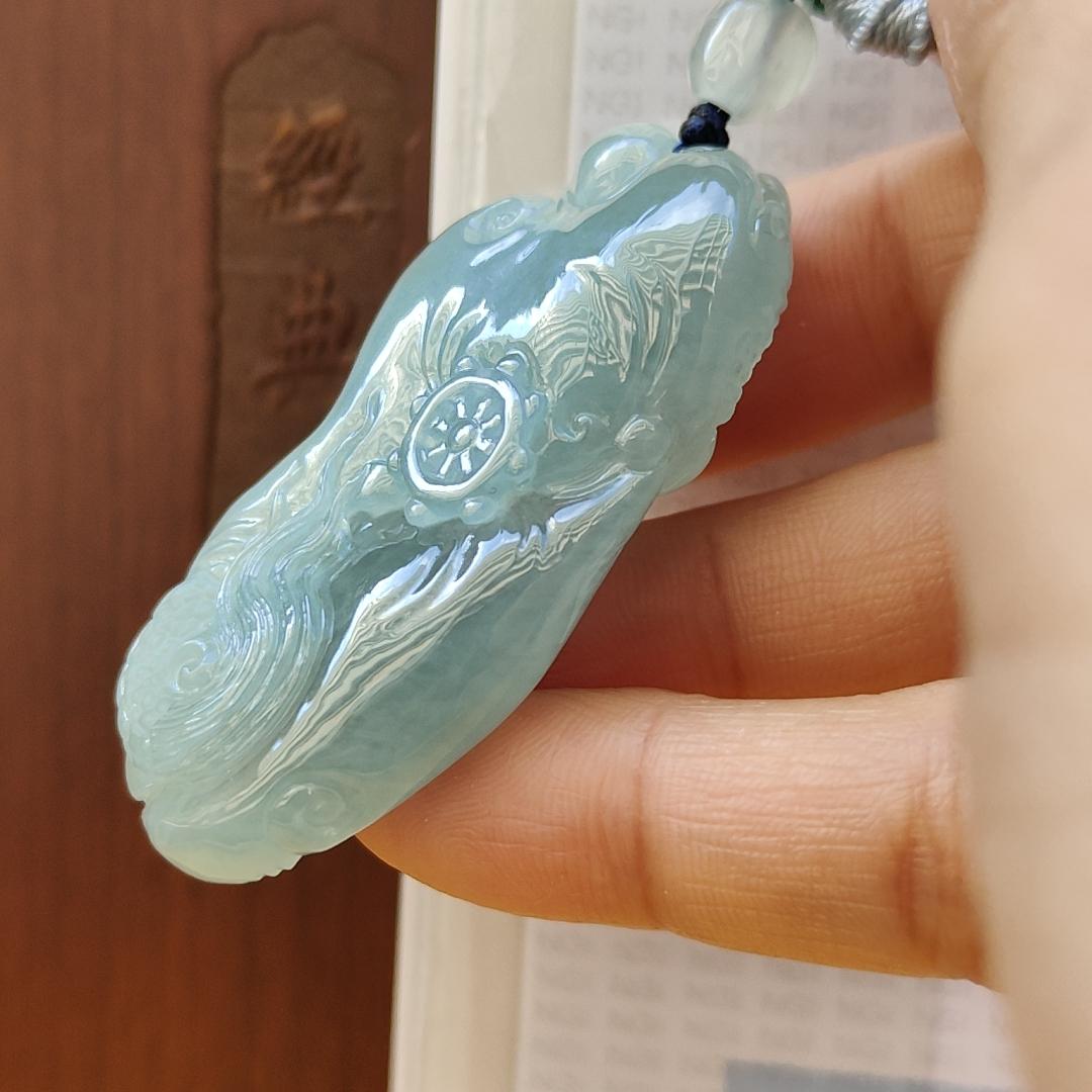 Natural Type A Jadeite Jewellery Pendant carved with dragon weighs at 30.06 grams , 50.32 * 23.30 * 12.93 mm - with Gemstone report from NGI - Very Good Translucency with faint greenish blue (pendant140) Yi Pin Qian
