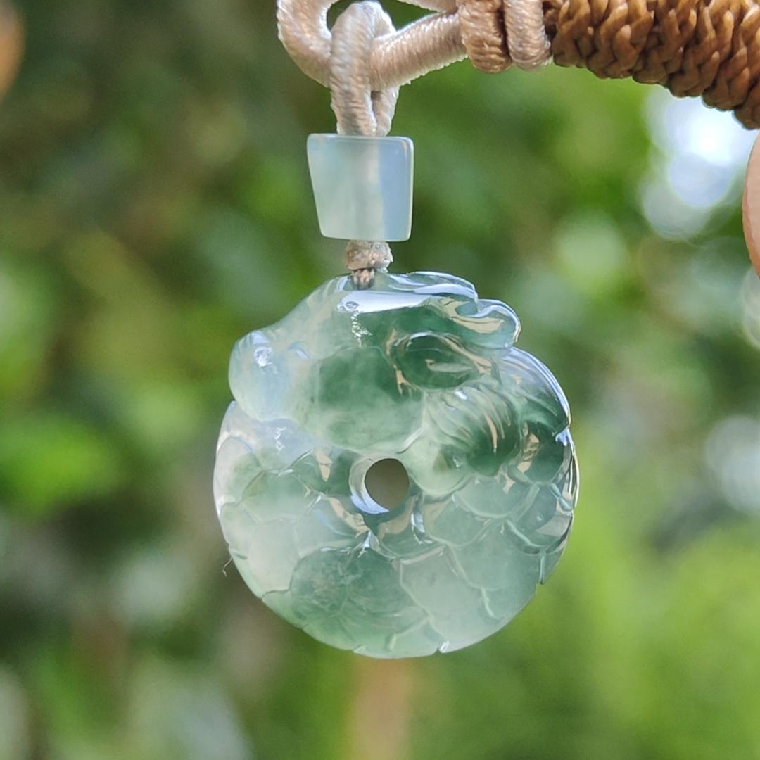 #Sold - High Quality Green with Green Patches Natural Type A Jadeite Jade crafted with shape of Donut with Baby Dragon as Pendant, QIC approved labs certificate weigh 4.11 grams, measurement 17.2 * 16.3 * 5.1 mm (pendant242)
