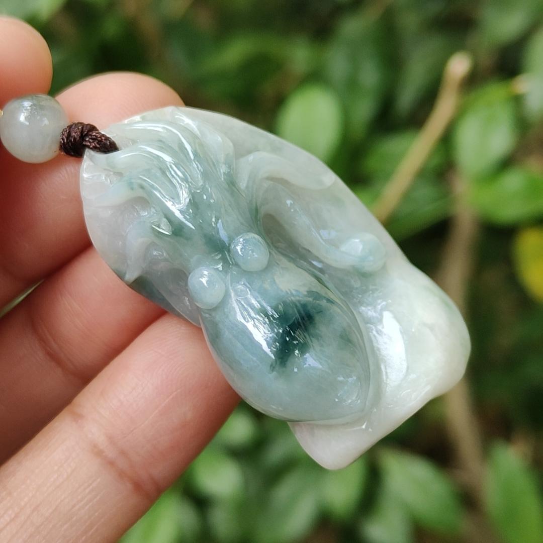 Crafted as Octopus Pendant on Natural Type A Jadeite Jade with rough skin certificate weighs 20.48 grams, measurement 38.6 * 20.3 * 17 mm (pendant354) Yi Pin Qian Jadeites Jade Jewelry ~Your Precious Quintessential ~ Singapore