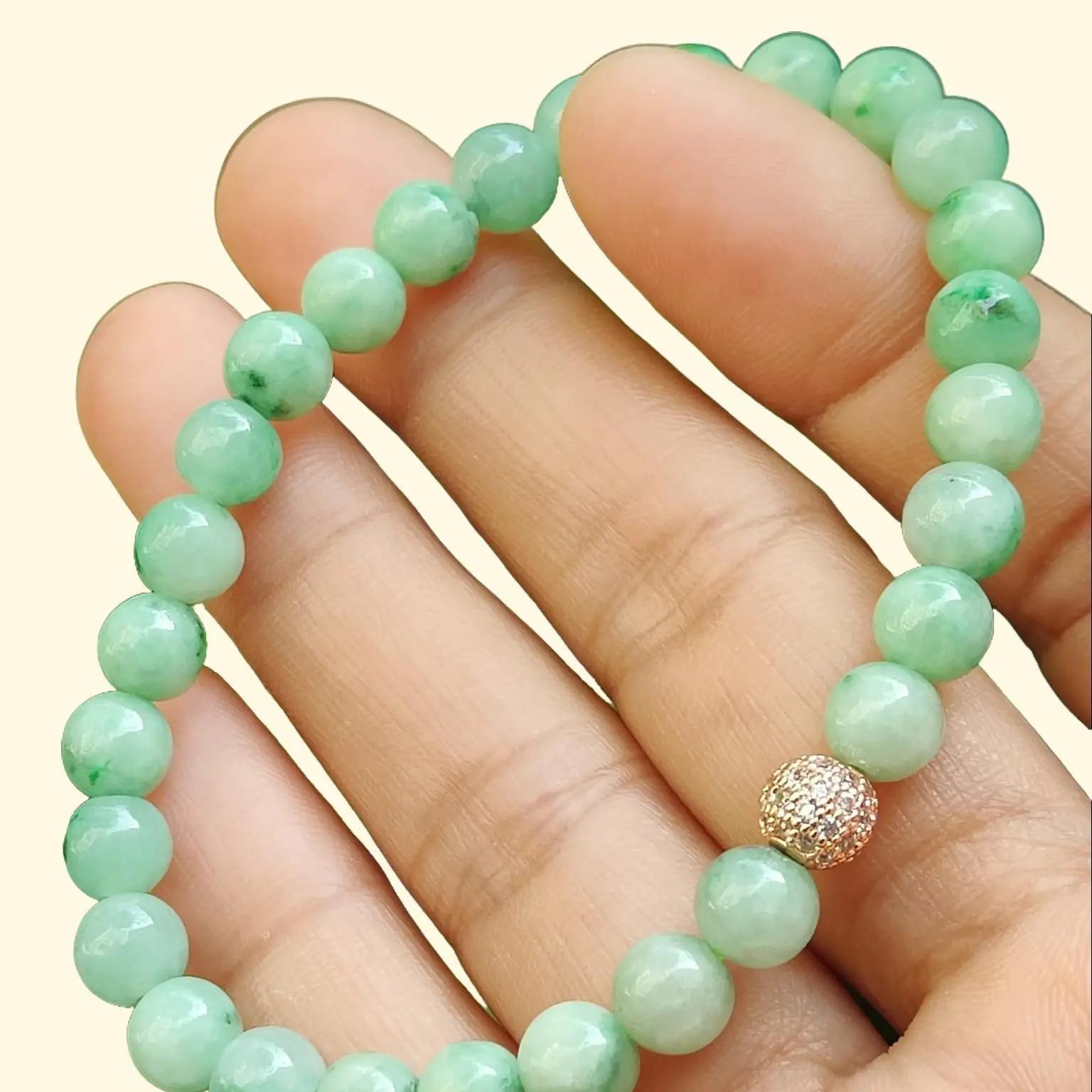 28 * 6.3 mm Light green with green patches beads Natural Type A Jadeite Jade bracelet, certificate weighs 12.64 grams (bracelet40) Yi Pin Qian Jadeites Jade Jewelry ~Your Precious Quintessential ~ Singapore
