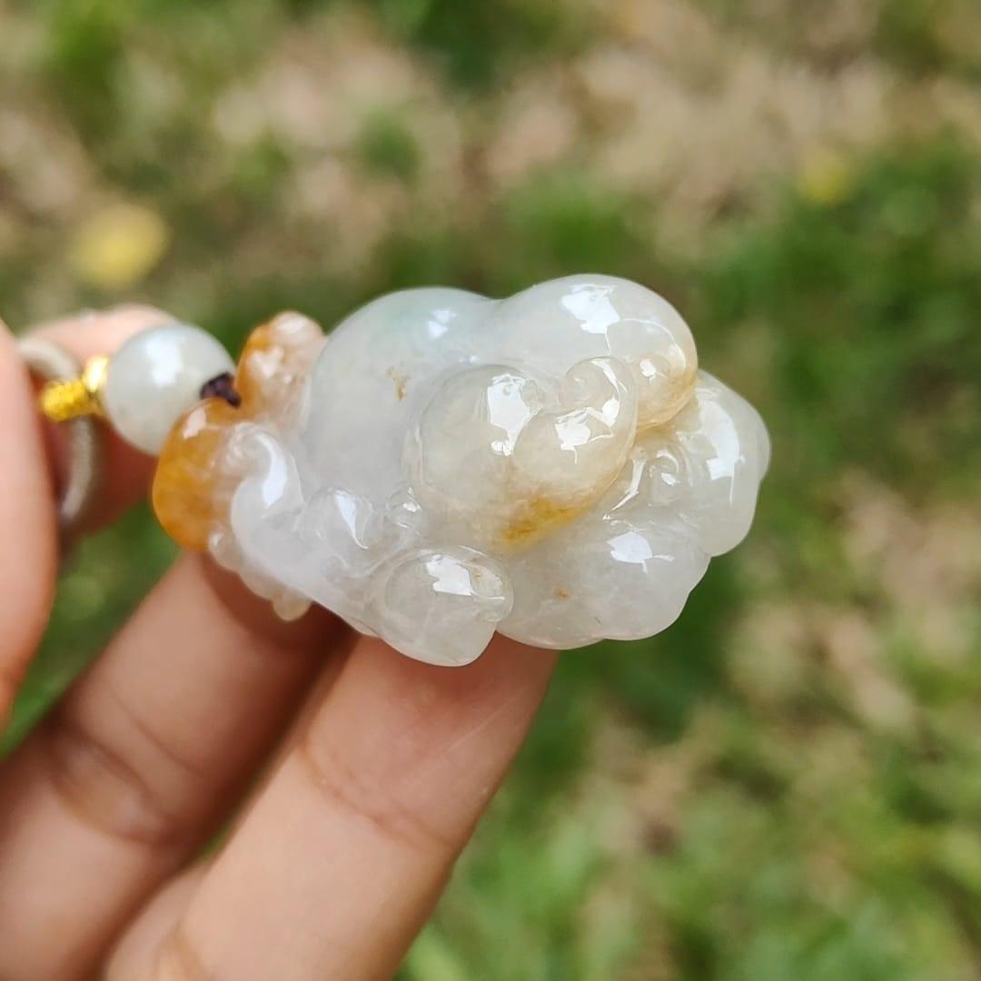 Unique Yellow Ruyi Chayote Natural Type A Jadeite Pendant with QIC approved labs certificate weight 25.27 grams, 40 * 25 * 15.20 mm originate from Myanmar very suitable for daily wear (pendant119) Yi Pin Qian